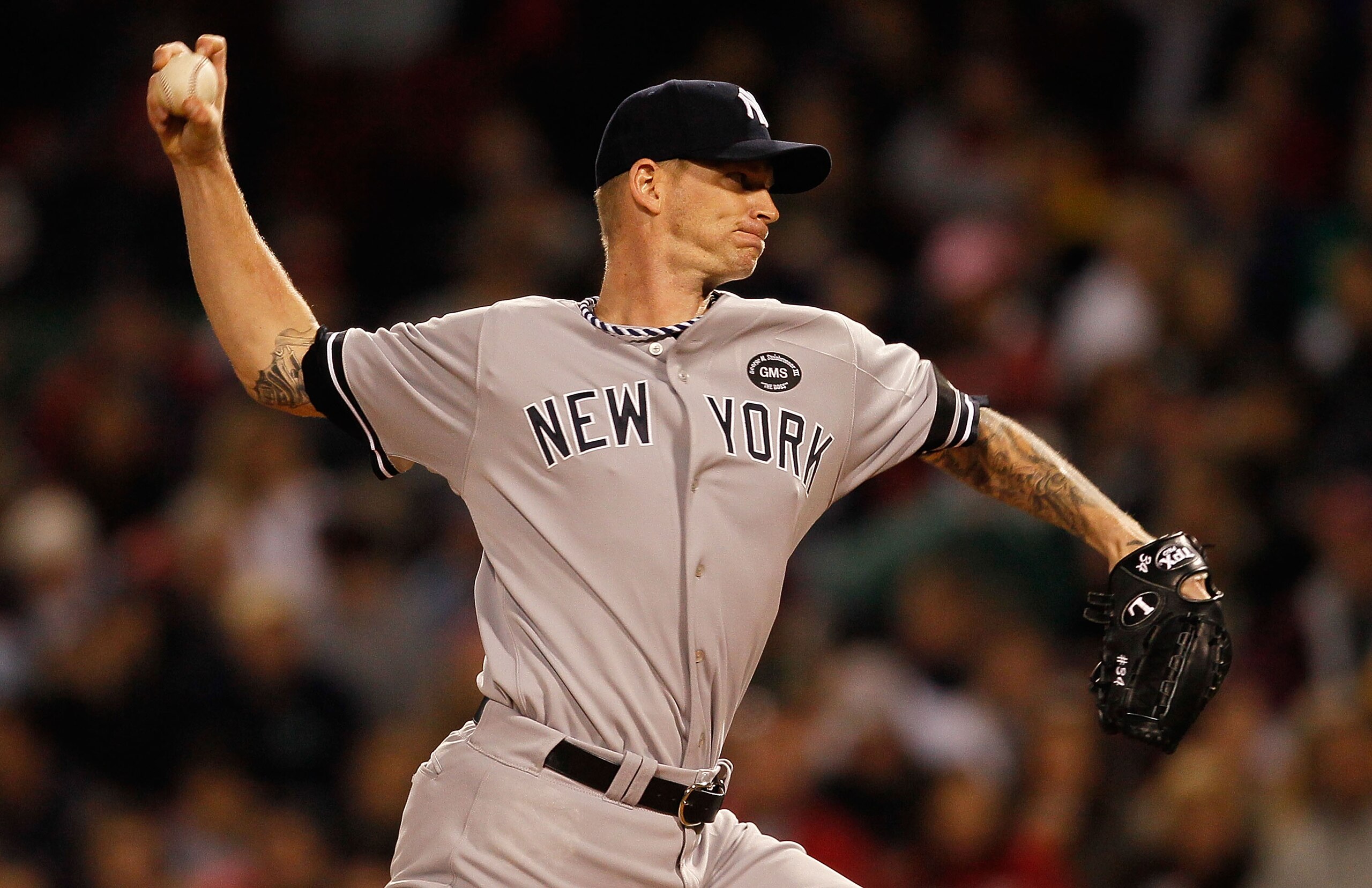 BOSTON - OCTOBER 2:  A.J. Burnett #34 of the New York Yankees throws against the Boston Red Sox in the second game of a doubleheader at Fenway Park, October 2, 2010, in Boston, Massachusetts. (Photo by Jim Rogash/Getty Images)