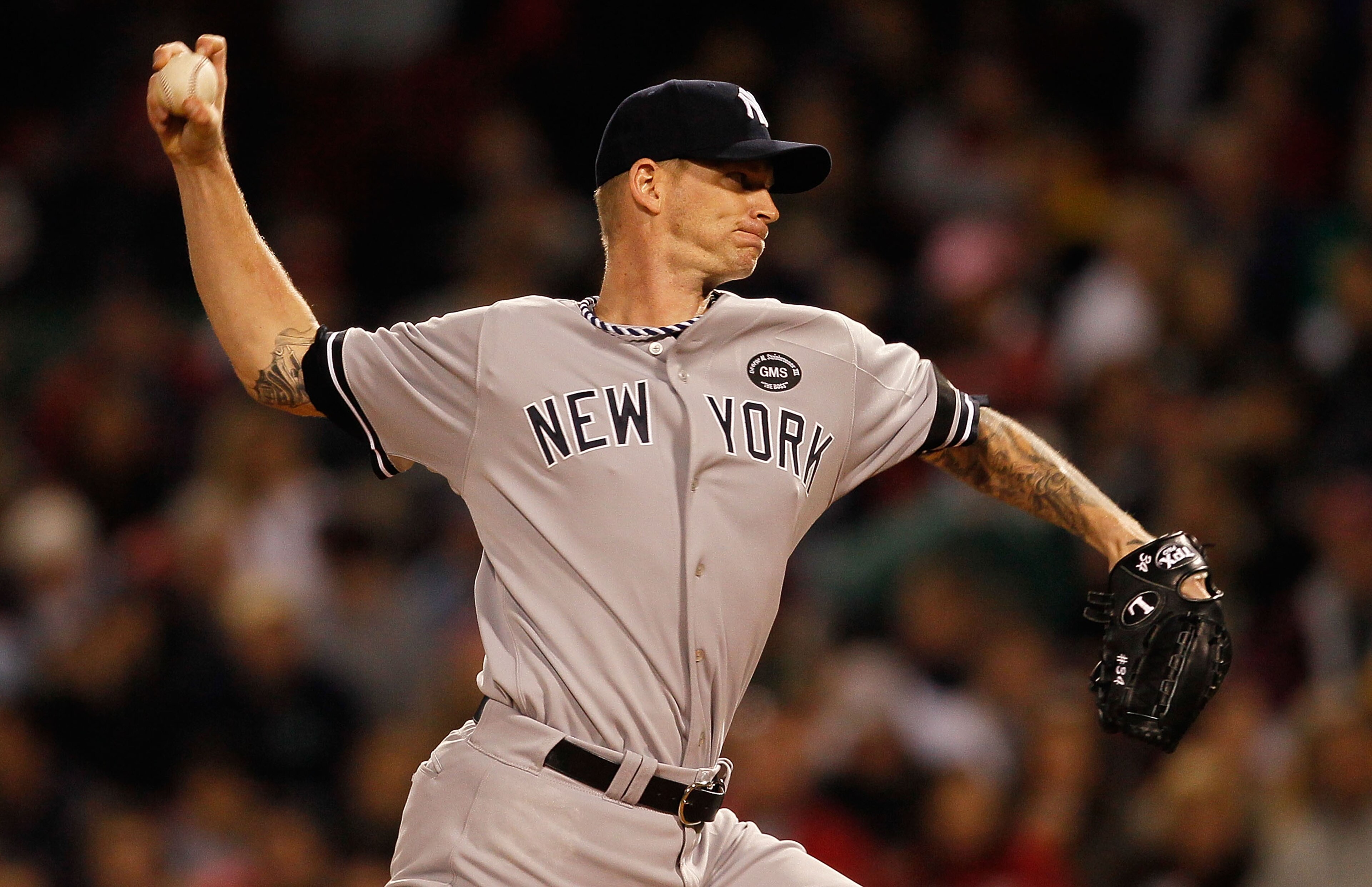 BOSTON - OCTOBER 2:  A.J. Burnett #34 of the New York Yankees throws against the Boston Red Sox in the second game of a doubleheader at Fenway Park, October 2, 2010, in Boston, Massachusetts. (Photo by Jim Rogash/Getty Images)