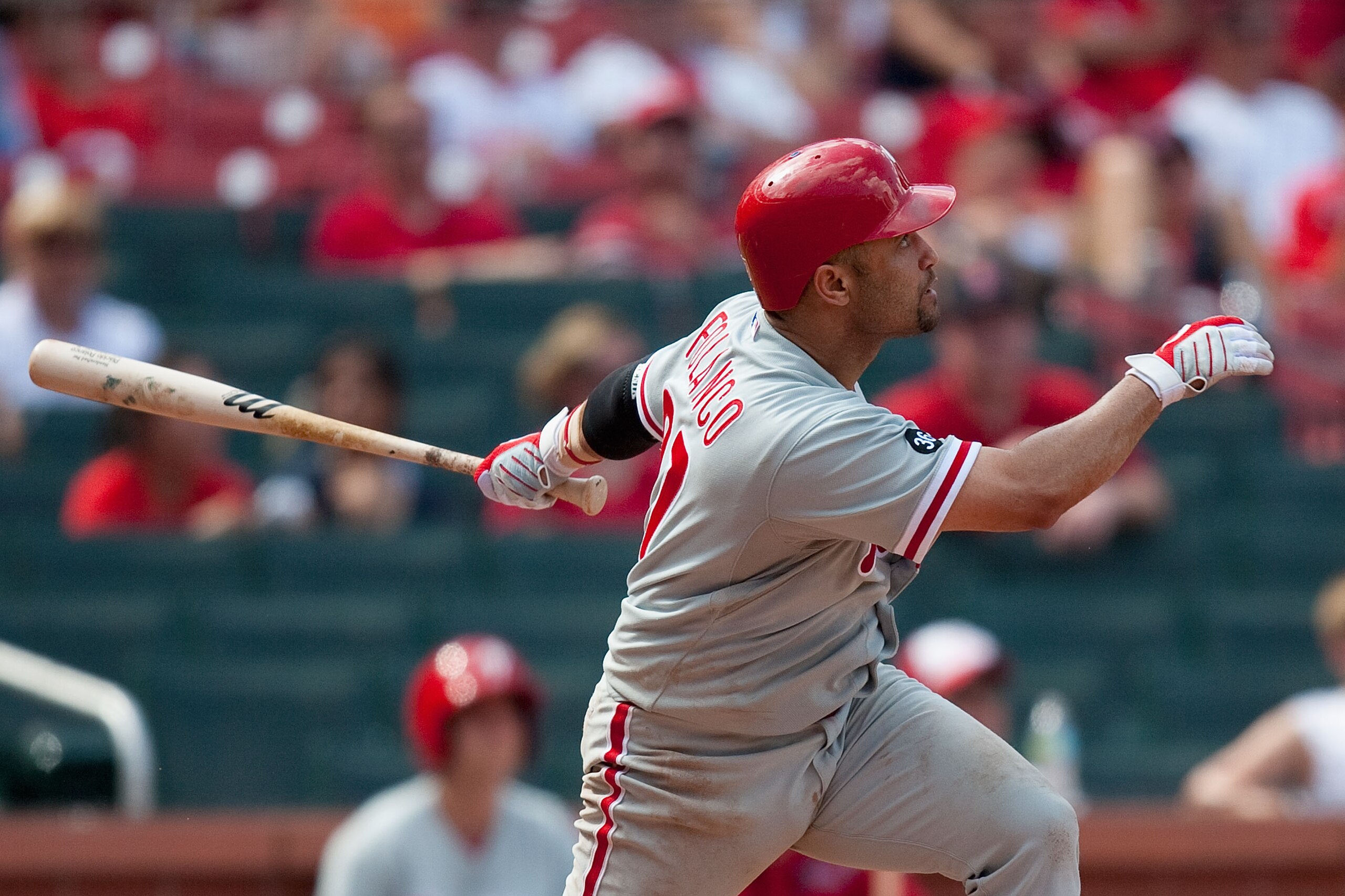 ST. LOUIS - JULY 22: Placido Polanco #27 of the Philadelphia Phillies watches his game-winning home run leave the park against the St. Louis Cardinals at Busch Stadium on July 22, 2010 in St. Louis, Missouri. The Phillies defeated the Cardinals 2-0.  (Pho