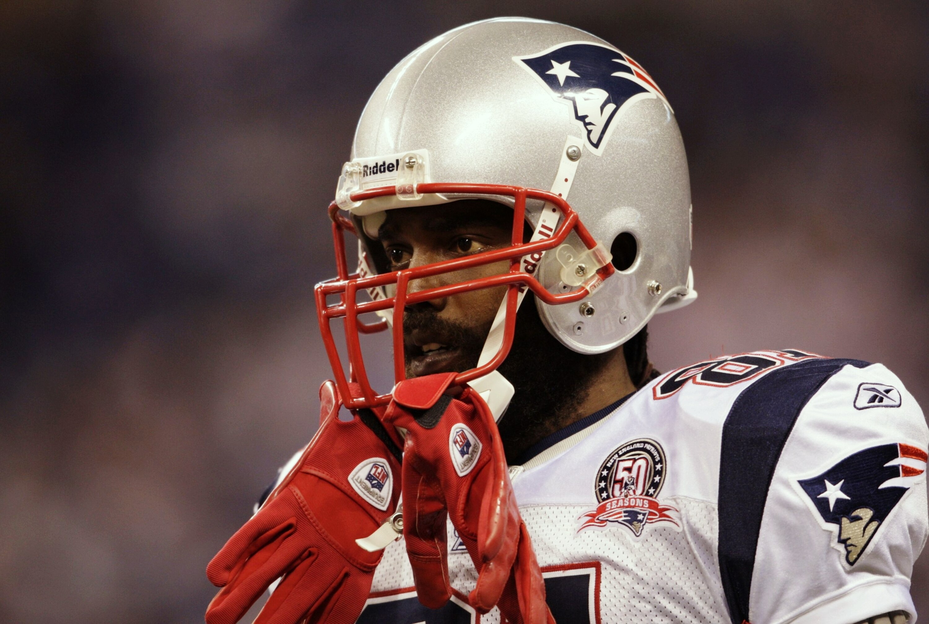 INDIANAPOLIS - NOVEMBER 15:  Randy Moss #81 of the New England Patriots looks on during warm ups before the game against the Indianapolis Colts at Lucas Oil Stadium on November 15, 2009 in Indianapolis, Indiana. (Photo by Andy Lyons/Getty Images)