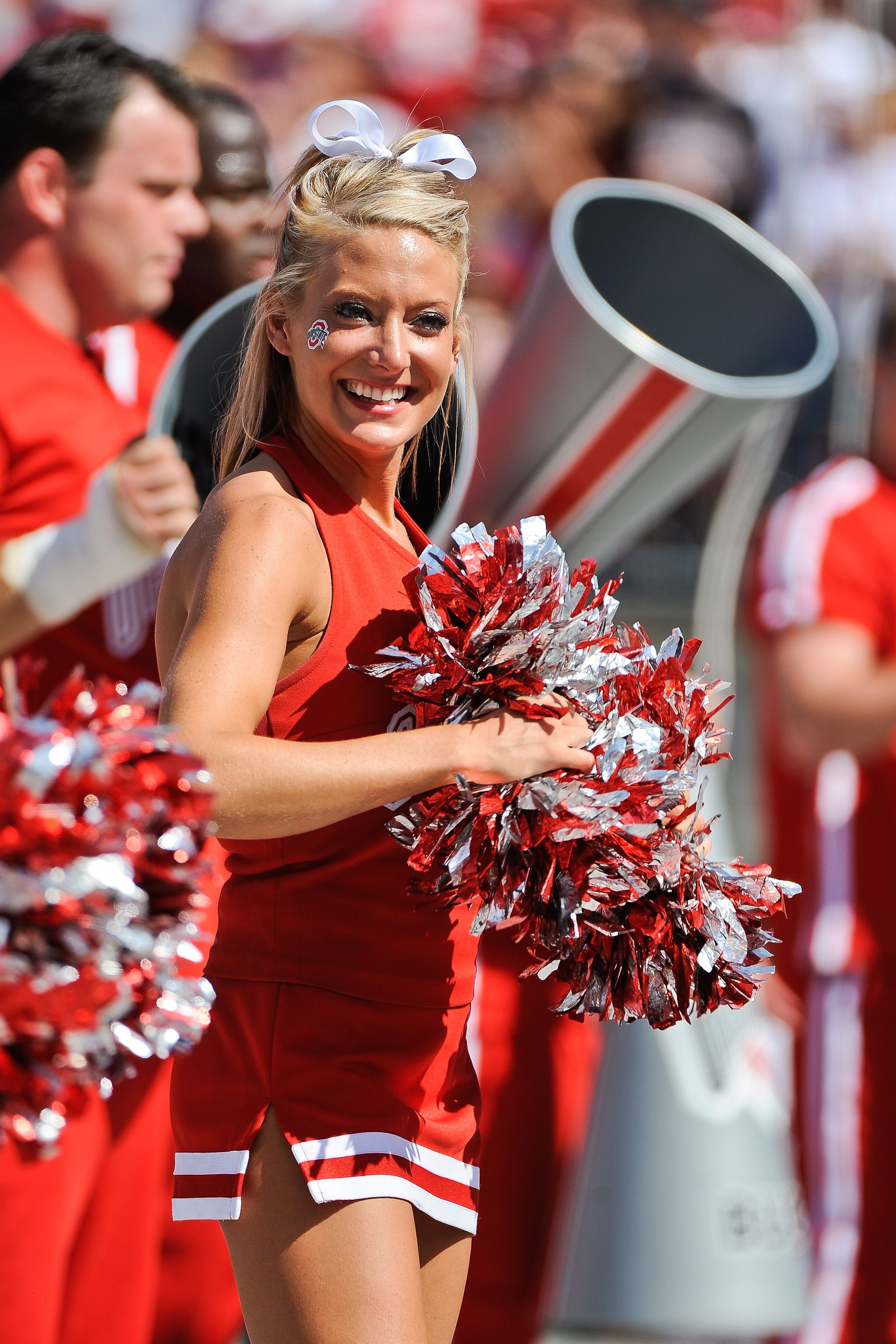 COLUMBUS, OH - SEPTEMBER 18: An Ohio State Buckeyes cheerleader cheers on the Buckeyes as they play the Ohio Bobcats at Ohio Stadium on September 18, 2010 in Columbus, Ohio. (Photo by Jamie Sabau/Getty Images) COLUMBUS, OH - SEPTEMBER 18: An Ohio State Buckeyes cheerleader cheers on the Buckeyes as they play the Ohio Bobcats at Ohio Stadium on September 18, 2010 in Columbus, Ohio. (Photo by Jamie Sabau/Getty Images)