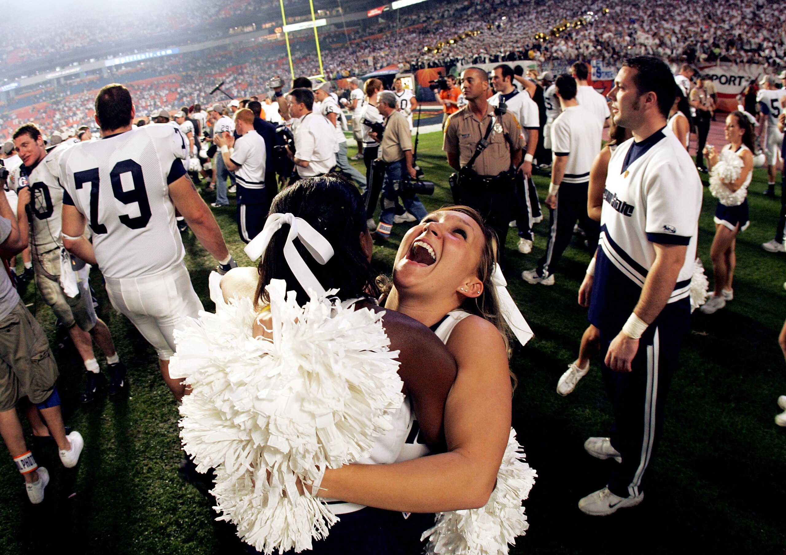 MIAMI - JANUARY 4:  Cheerleader Genevieve Evans of the Penn State Nittany Lions celebrates after victory over the Florida State Seminoles during the FedEx Orange Bowl on January 4, 2006 at Dolphins Stadium in Miami, Florida. Penn State defeated Florida St