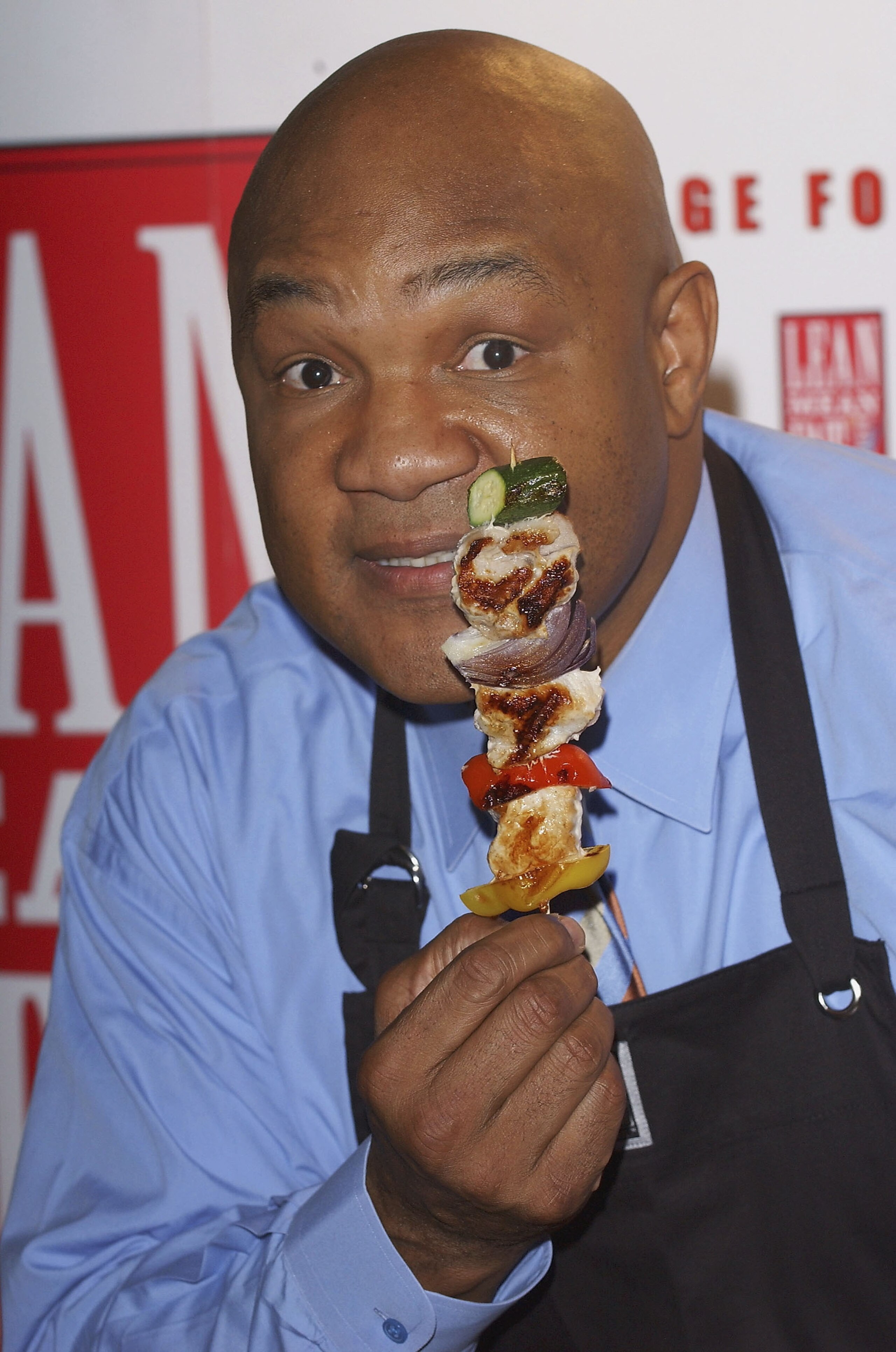 LONDON - DECEMBER 17:  Former World Heavyweight Champion George Foreman launches new additions to his Lean Mean range, at No 5, Cavendish Square on December 17, 2003 in London. New additions include the Lean Mean Toasting Machine and the Lean Mean Boiling