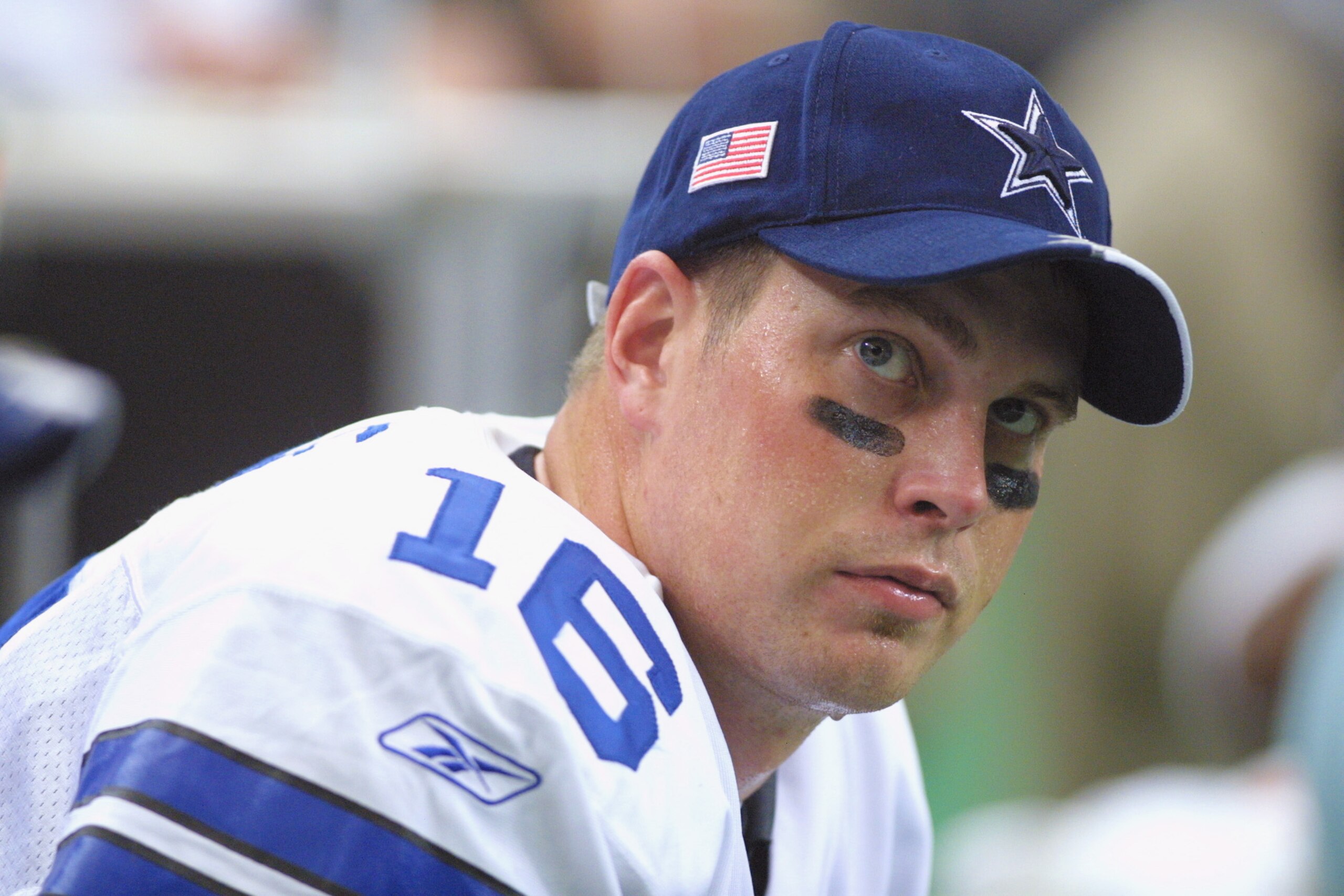 ATLANTA - NOVEMBER 11:  Quarterback Ryan Leaf #16 of the Dallas Cowboys looks on from the bench during the game against the Atlanta Falcons at the Georgia Dome in Atlanta, Georgia on November 11, 2001. The Falcons won 20-13.   (Photo by Scott Halleran /Ge