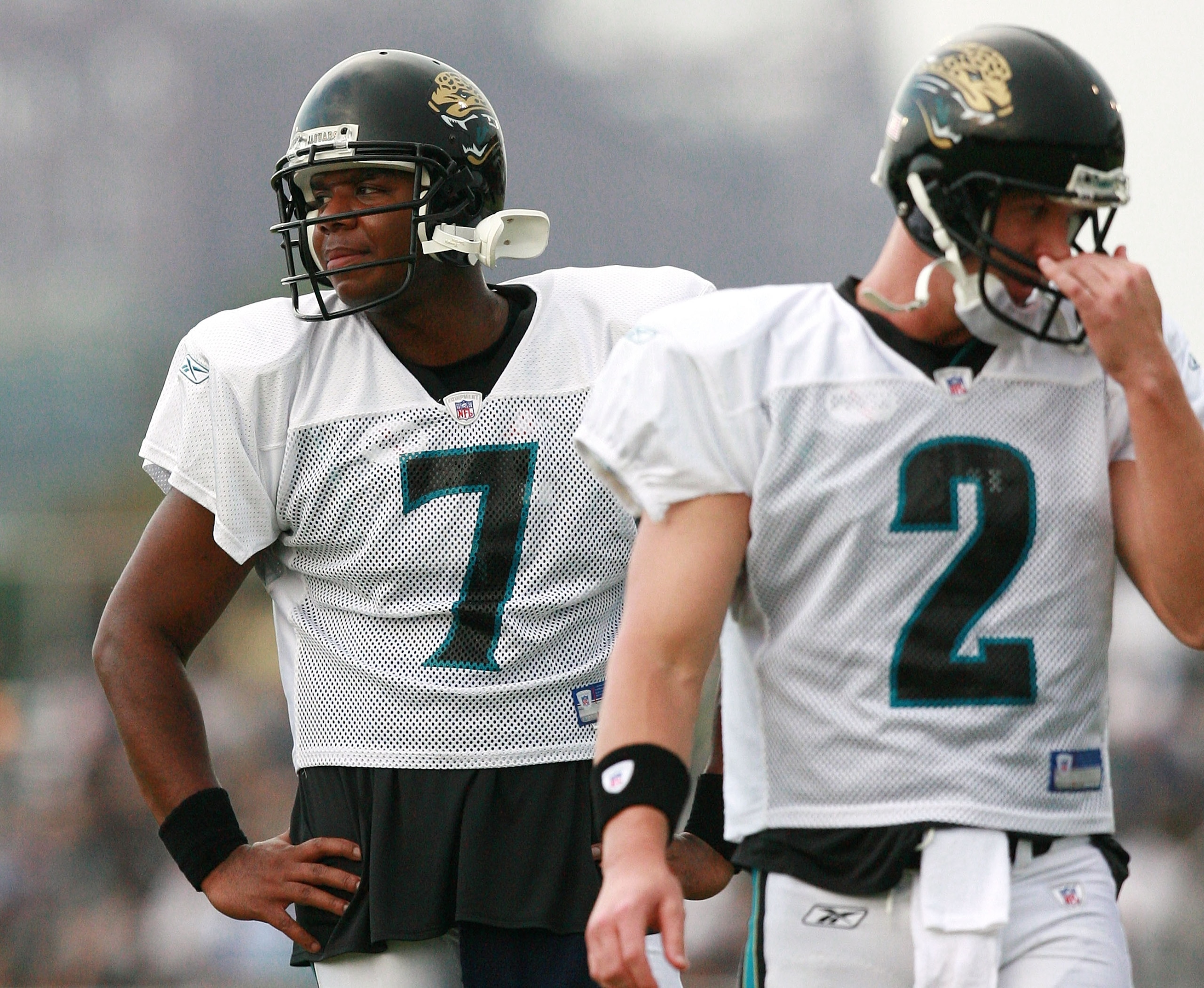 JACKSONVILLE, FL - JULY 31:  Quaterback Byron Leftwich #7 of the Jacksonville Jaguars looks the other way as Tim Couch #2 goes through reps during training camp at Alltel Stadium practice facililty on July 31, 2007 in Jacksonville, Florida.  (Photo by Dou