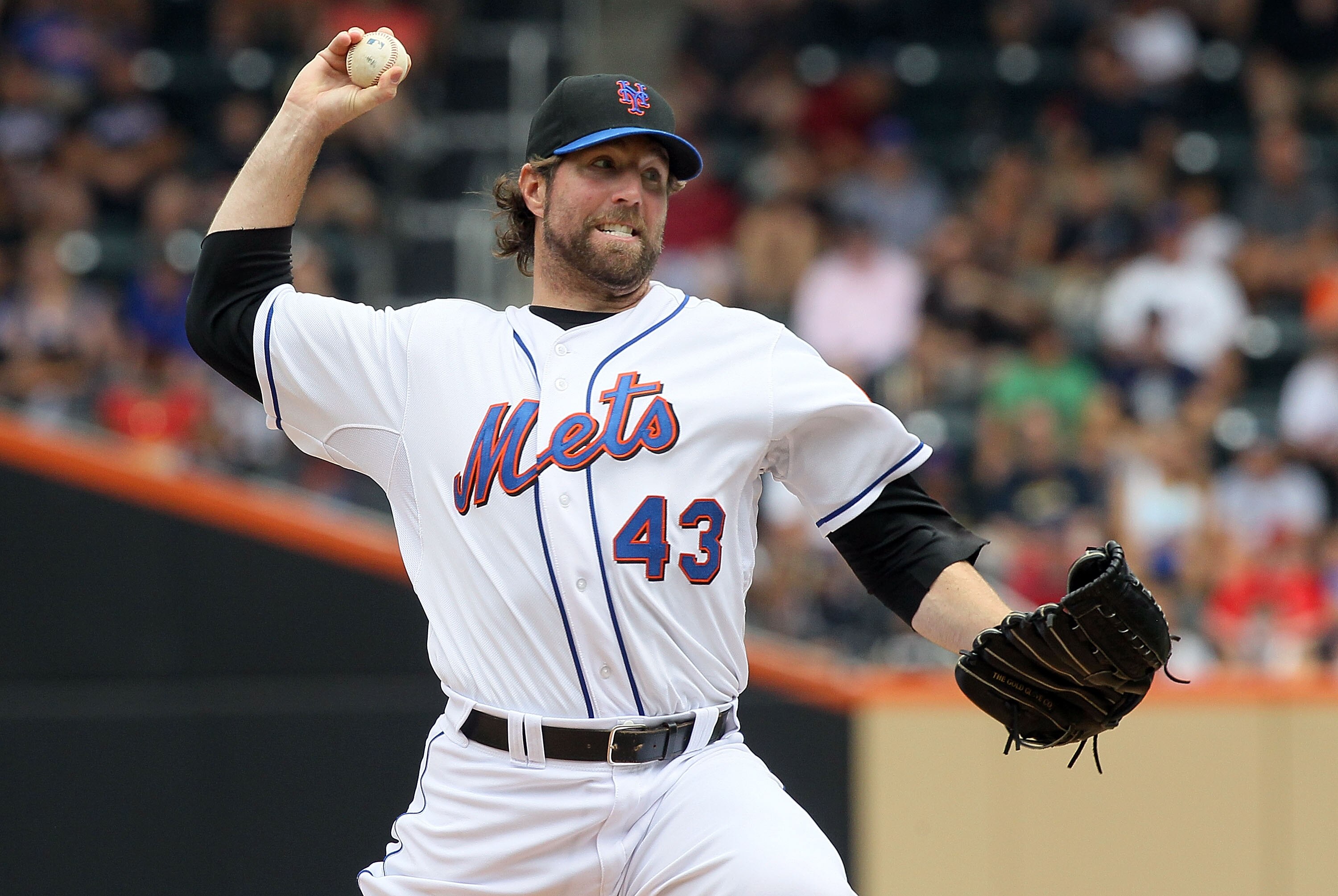 NEW YORK - JULY 29:  R.A. Dickey #43 of the New York Mets delivers a pitch against the St. Louis Cardinals on July 29, 2010 at Citi Field in the Flushing neighborhood of the Queens borough of New York City.  (Photo by Jim McIsaac/Getty Images)