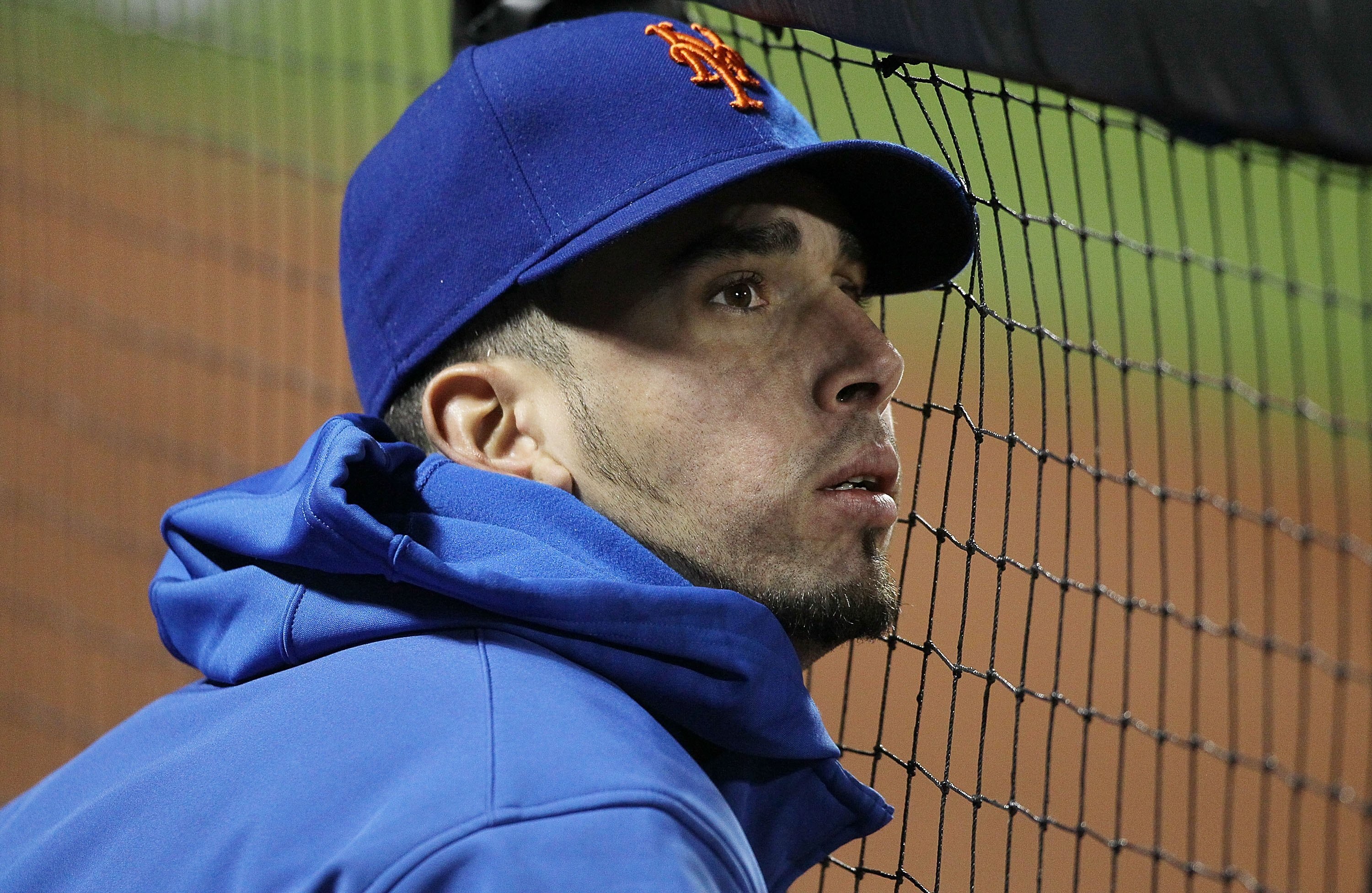 NEW YORK - MAY 10:  Oliver Perez #46 of the New York Mets looks on from the dugout against the Washington Nationals on May 10, 2010 at Citi Field in the Flushing neighborhood of the Queens borough of New York City.  (Photo by Jim McIsaac/Getty Images)