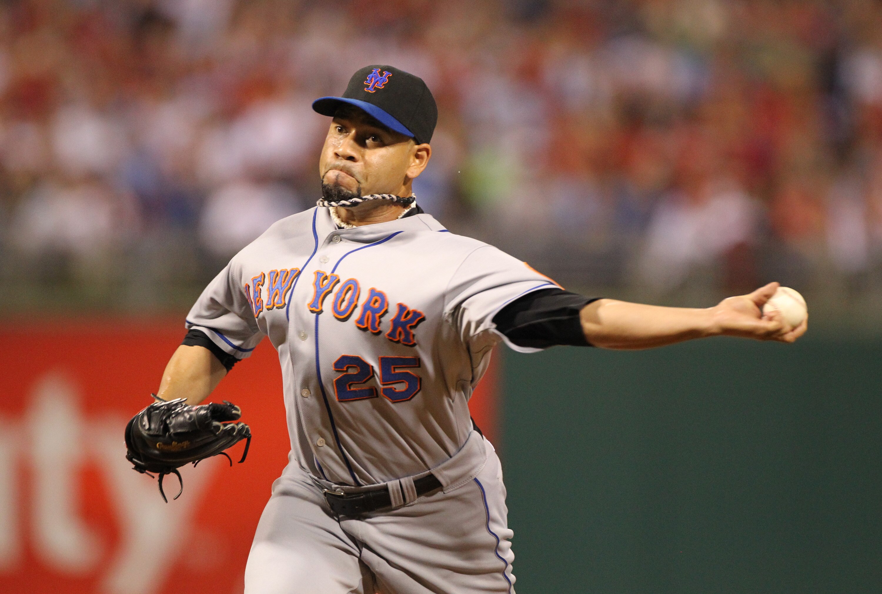 PHILADELPHIA - SEPTEMBER 25: Relief pitcher Pedro Feliciano #25 of the New York Mets throws a pitch during a game against the Philadelphia Phillies at Citizens Bank Park on September 25, 2010 in Philadelphia, Pennsylvania. The Mets won 5-2. (Photo by Hunt