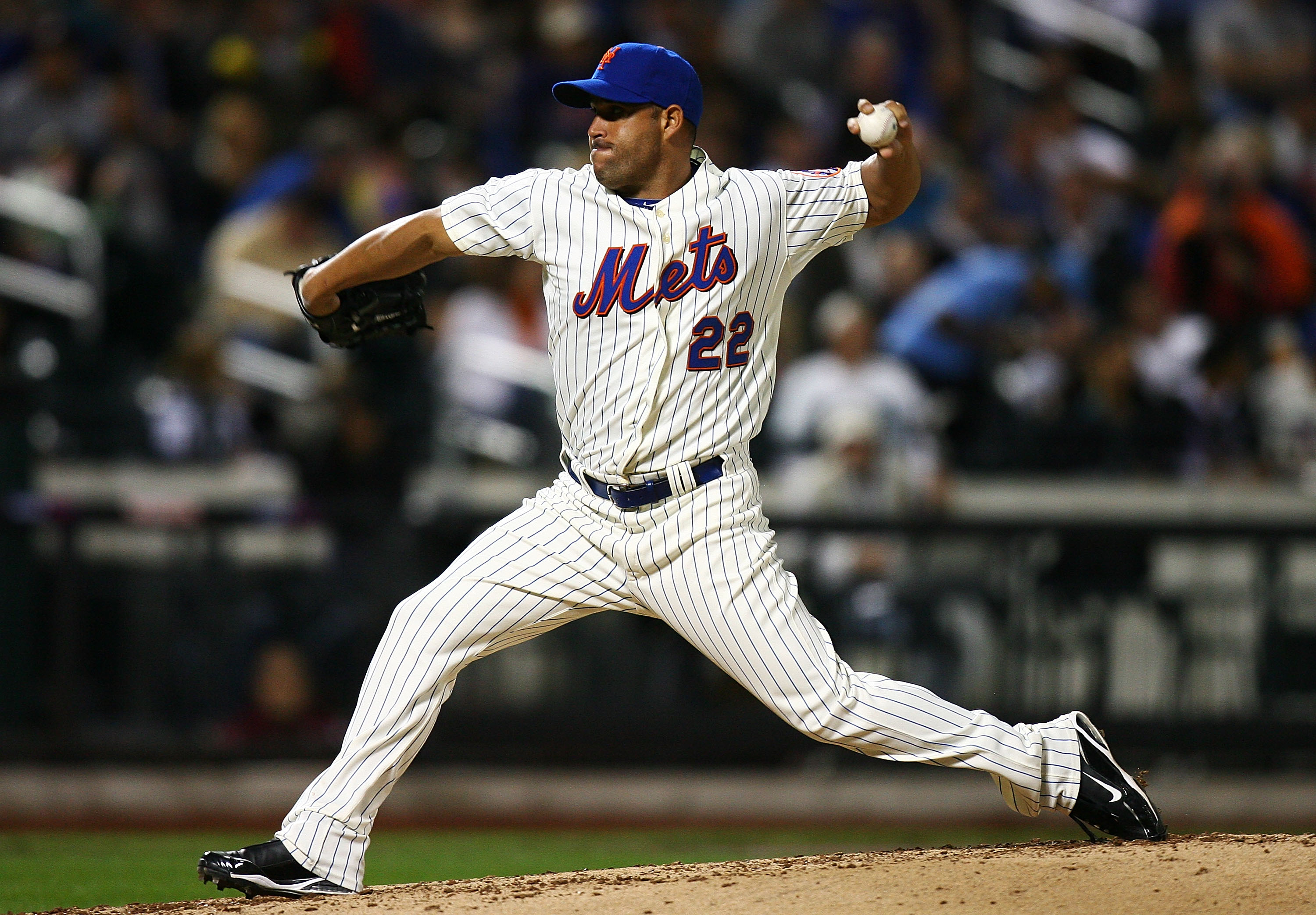 NEW YORK - SEPTEMBER 15:  Raul Valdes #22 of the New York Mets pitches against the Pittsburgh Pirates on September 15, 2010 at Citi Field in the Flushing neighborhood of the Queens borough of New York City.  (Photo by Andrew Burton/Getty Images)