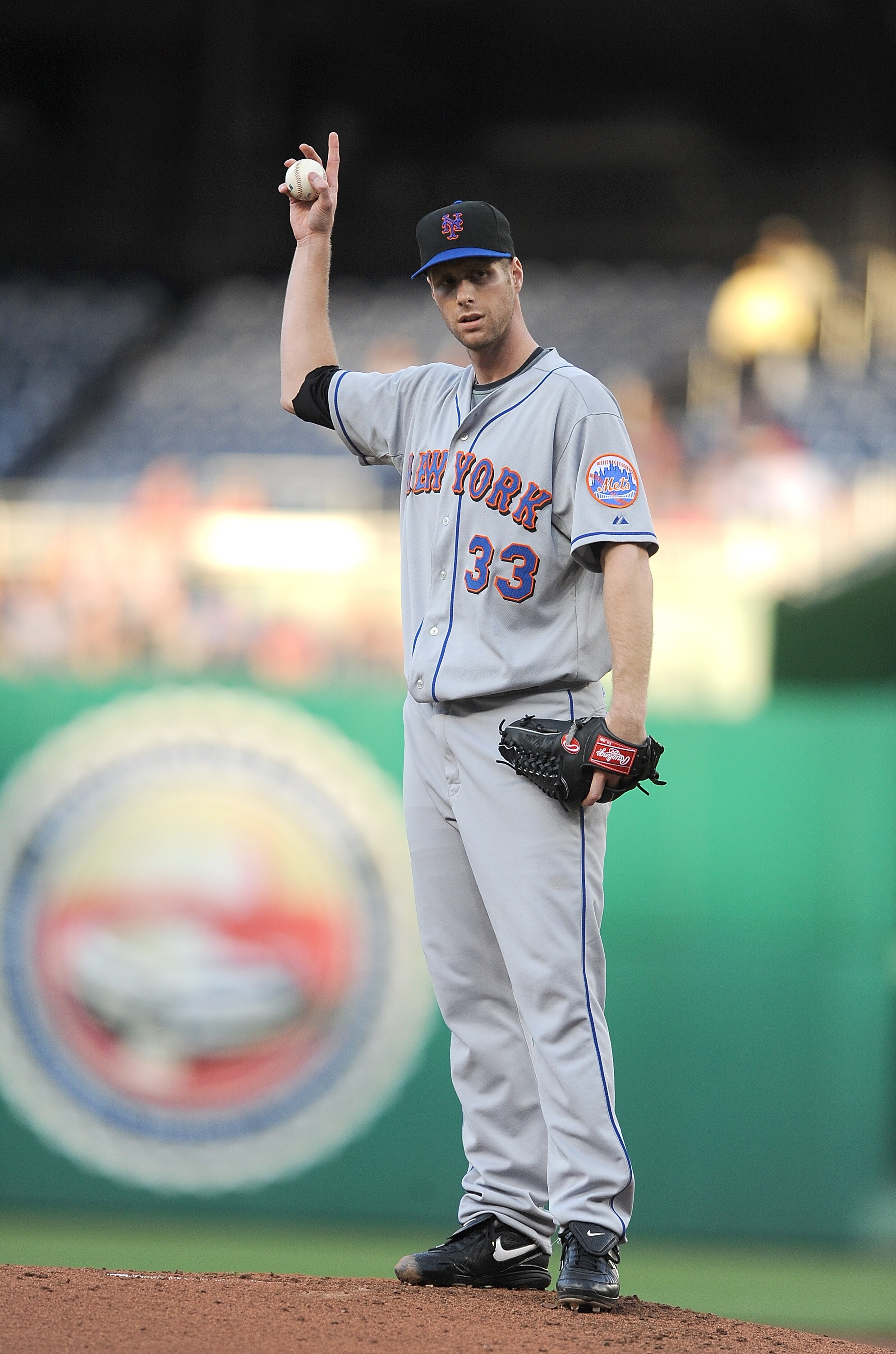 WASHINGTON - MAY 20:  John Maine #33 of the New York Mets motions towards the dugout during the first inning of the game against the Washington Nationals at Nationals Park on May 20, 2010 in Washington, DC.  (Photo by Greg Fiume/Getty Images)