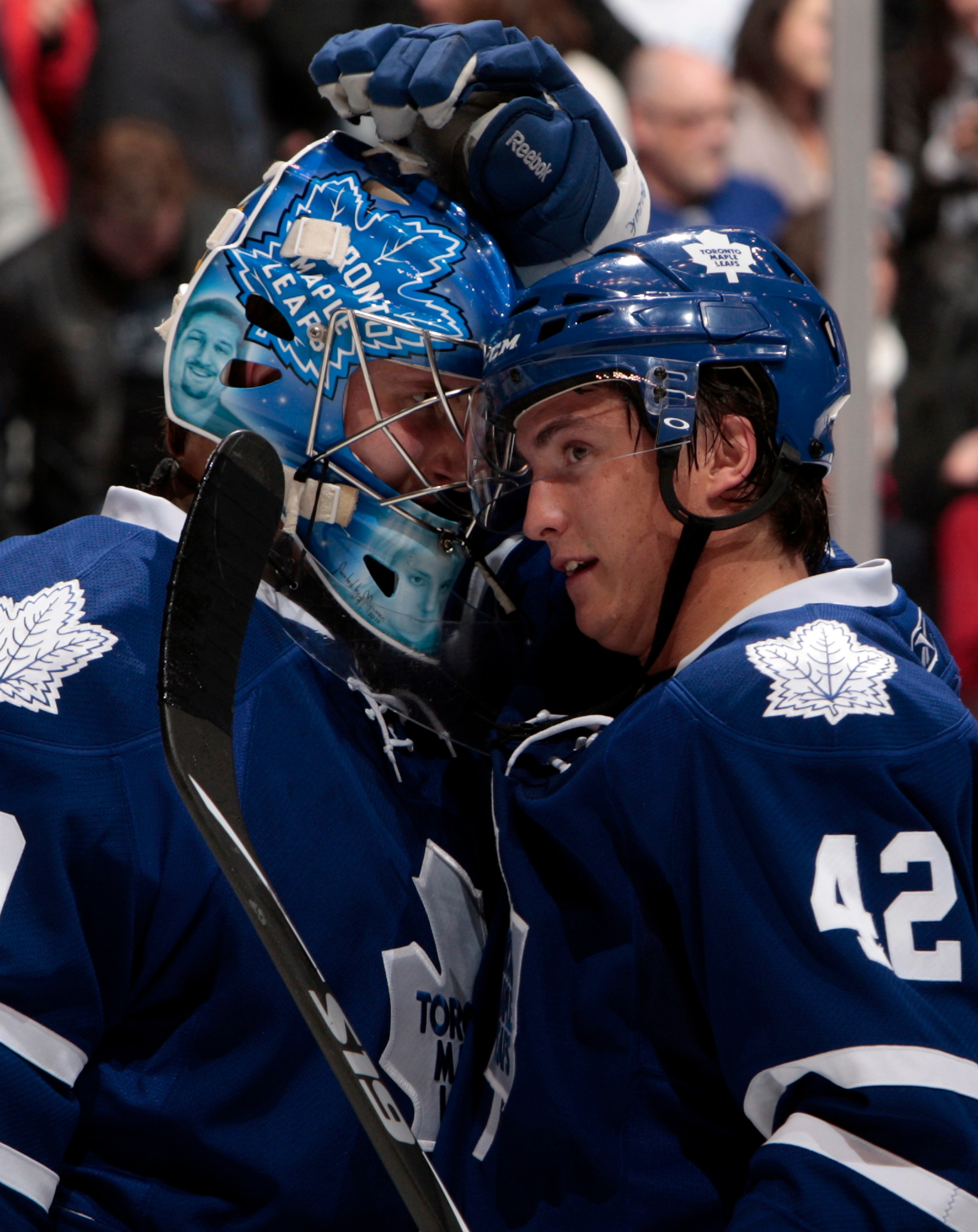 TORONTO - OCTOBER 2: Jussi Rynnas #40 and Tyler Bozak #42 of the Toronto Maple Leafs celebrate the 4-2 win against the Detroit Red Wings during a preseason NHL game at the Air Canada Centre October 2, 2010 in Toronto, Ontario, Canada. (Photo by Abelimages