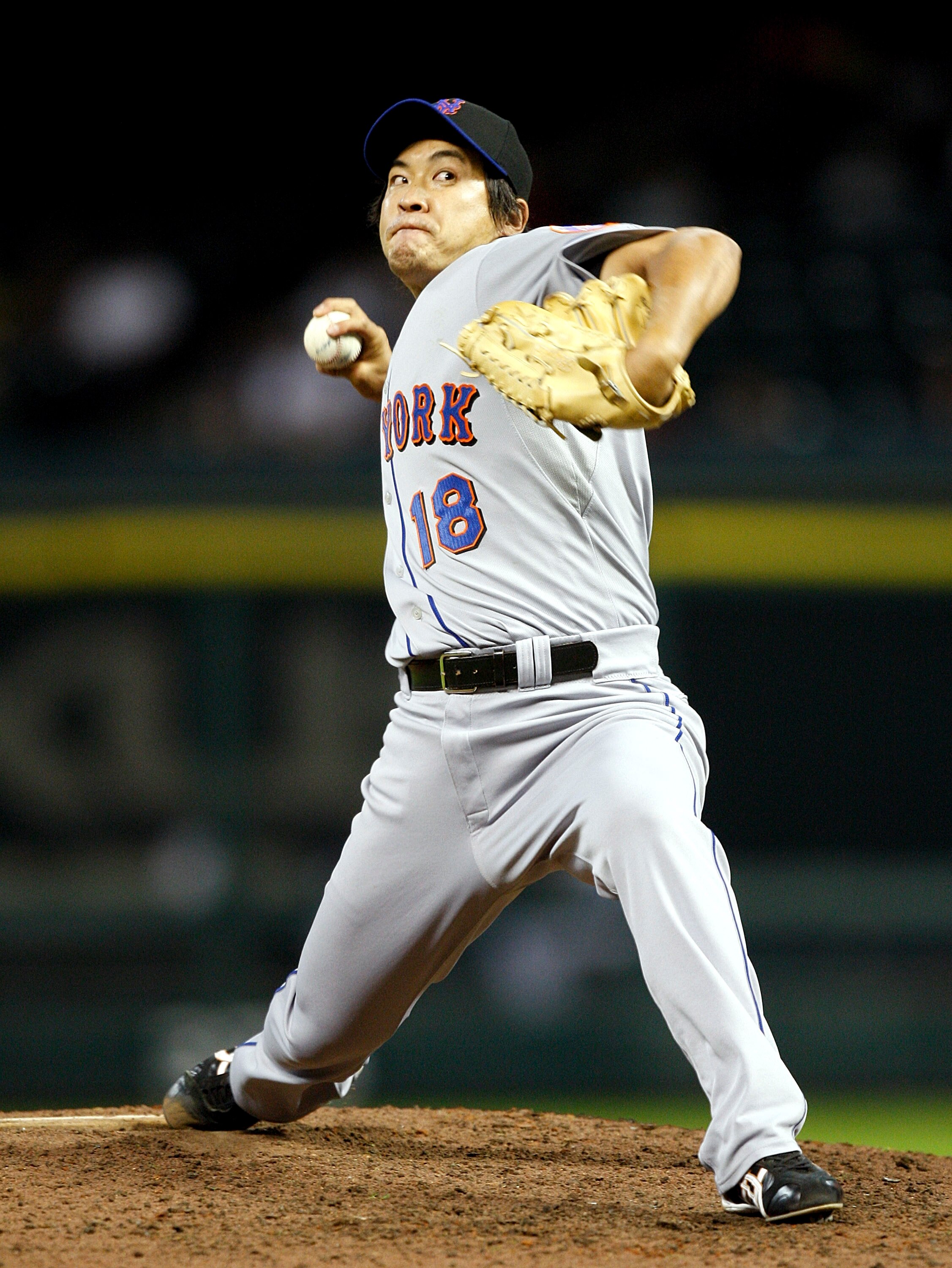 HOUSTON - AUGUST 19:  Pitcher Ryota Igarashi #18 of the New York Mets throws against the Houston Astros at Minute Maid Park on August 19, 2010 in Houston, Texas.  (Photo by Bob Levey/Getty Images)