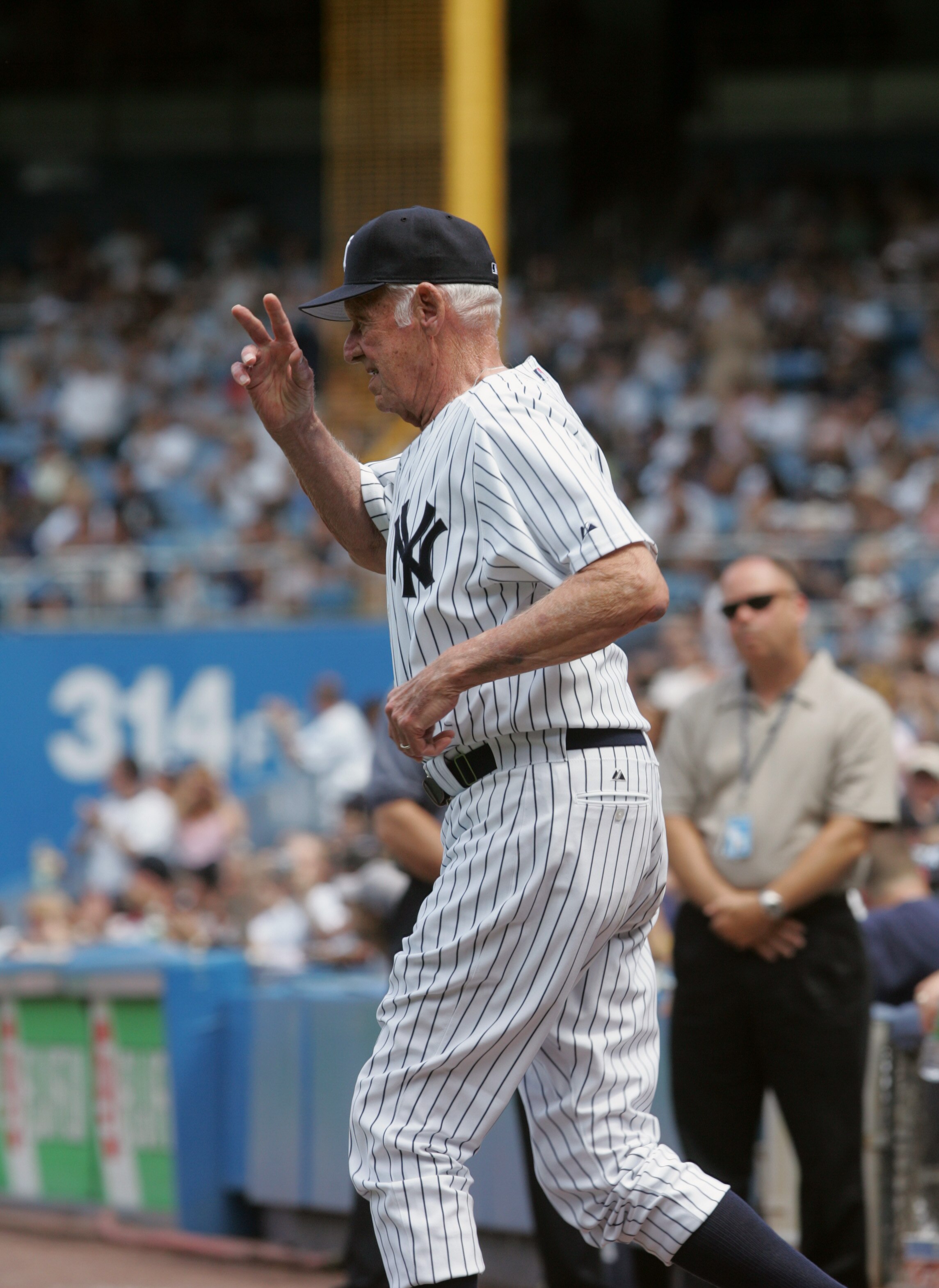 NEW YORK - JULY 9:  Don Larsen waves to the fans during the New York Yankees 59th annual old-timers' day before the start of the Yankees game against the Cleveland Indians on July 9, 2005 at Yankee Stadium in the Bronx borough of New York City. The Indian