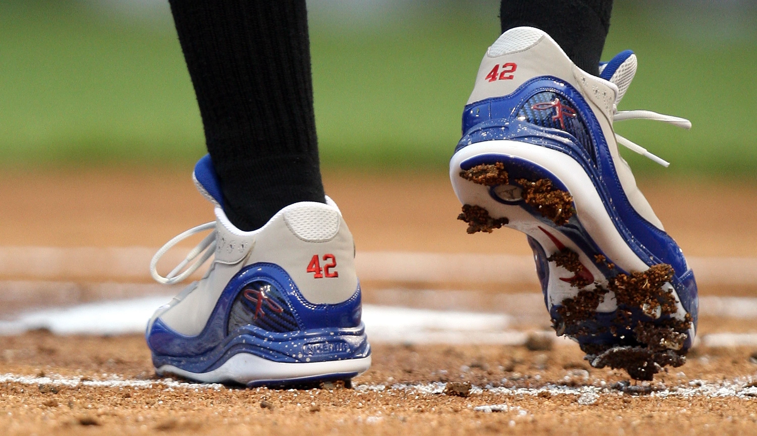 ARLINGTON, TX - APRIL 15:  The shoes of Adam Jones of the Baltimore Orioles with the #42 to commemorate Jackie Robinson day during a game against the Texas Rangers on April 15, 2009 at Rangers Ballpark in Arlington, Texas.  (Photo by Ronald Martinez/Getty