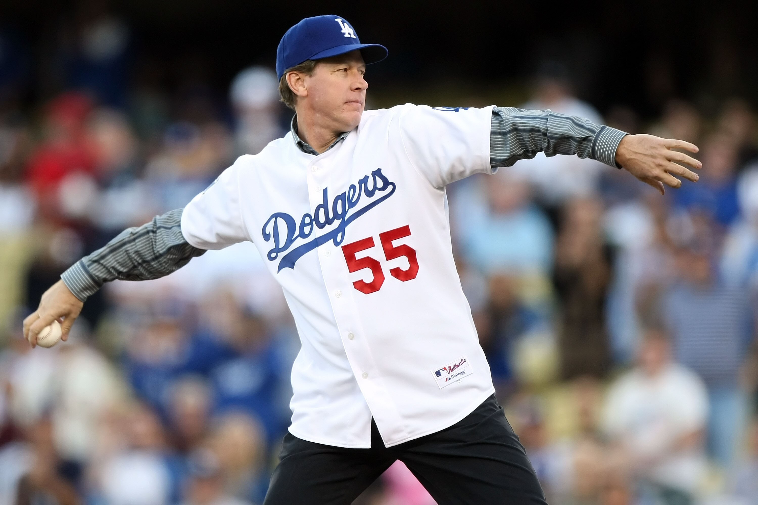 LOS ANGELES, CA - OCTOBER 13:  Former Los Angeles Dodgers pitcher Orel Hershiser throws out the first pitch before the Dodgers take on the Philadelphia Phillies in Game Four of the National League Championship Series during the 2008 MLB playoffs on Octobe