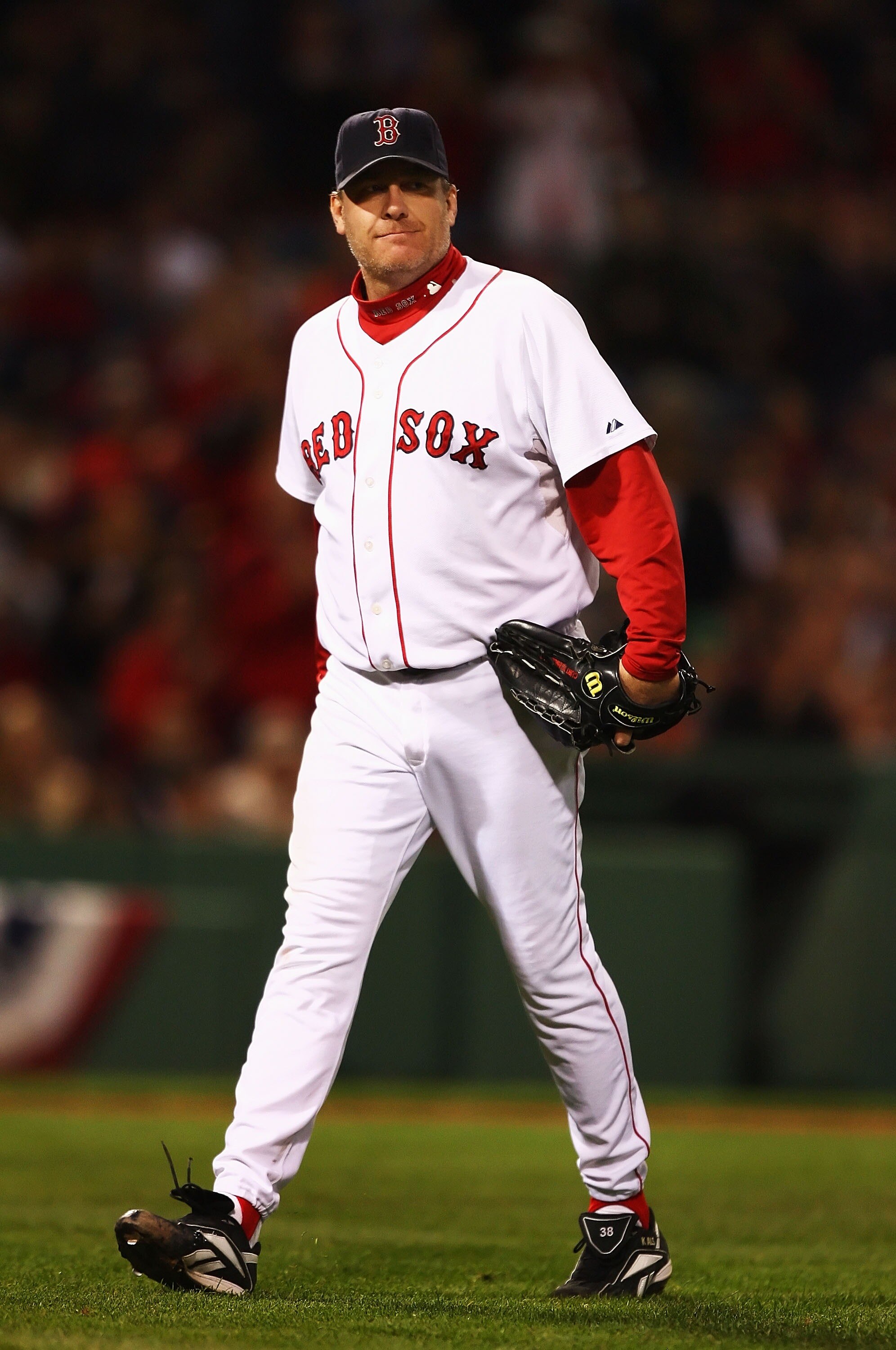BOSTON - OCTOBER 20:  Starting pitcher Curt Schilling #38 of the Boston Red Sox smiles after closing out the seventh inning against the Cleveland Indians during Game Six of the American League Championship Series at Fenway Park on October 20, 2007 in Bost