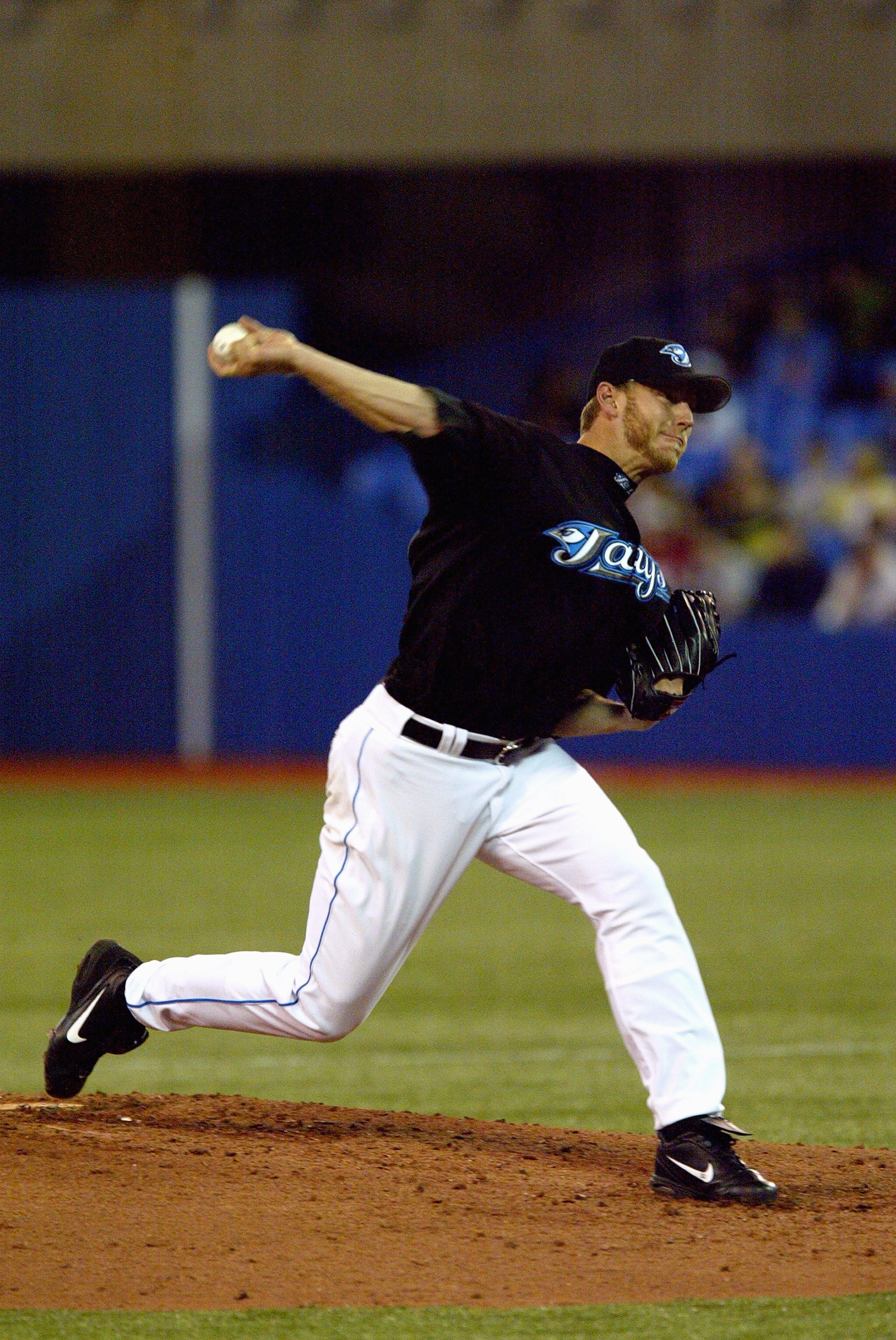 TORONTO - APRIL 9:  Roy Halladay #32 of the Toronto Blue Jays pitches against the Boston Red Sox during the game at Rogers Centre on April 9, 2005 in Toronto, Ontario, Canada.  The Blue Jays defeated the Red Sox 12-5.  (Photo by Dave Sandford/Getty Images