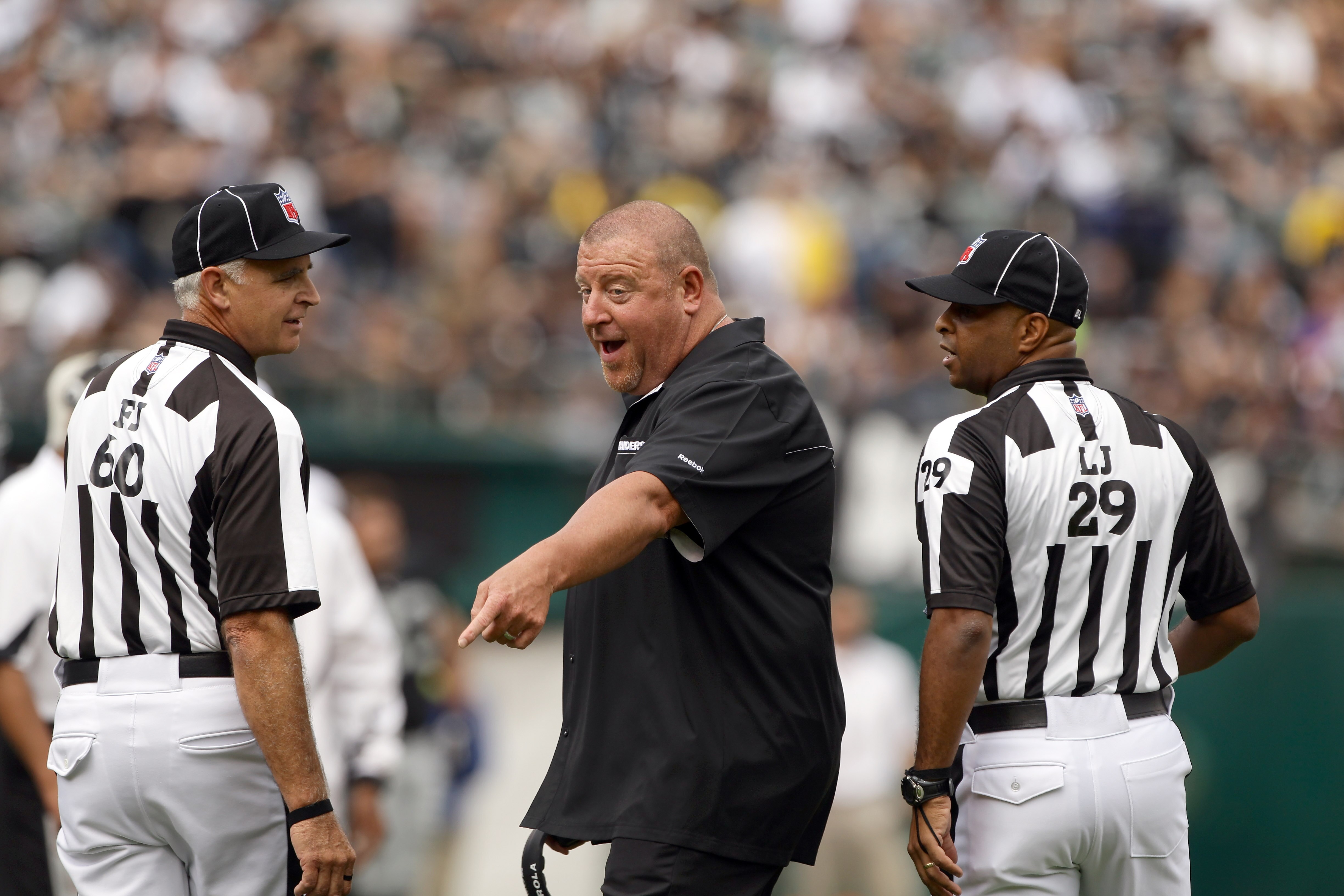 OAKLAND, CA - SEPTEMBER 19:  Head coach Tom Cable of the Oakland Raiders walks the sidelines during their game against the St. Louis Rams at the Oakland-Alameda County Coliseum on September 19, 2010 in Oakland, California.  (Photo by Ezra Shaw/Getty Image