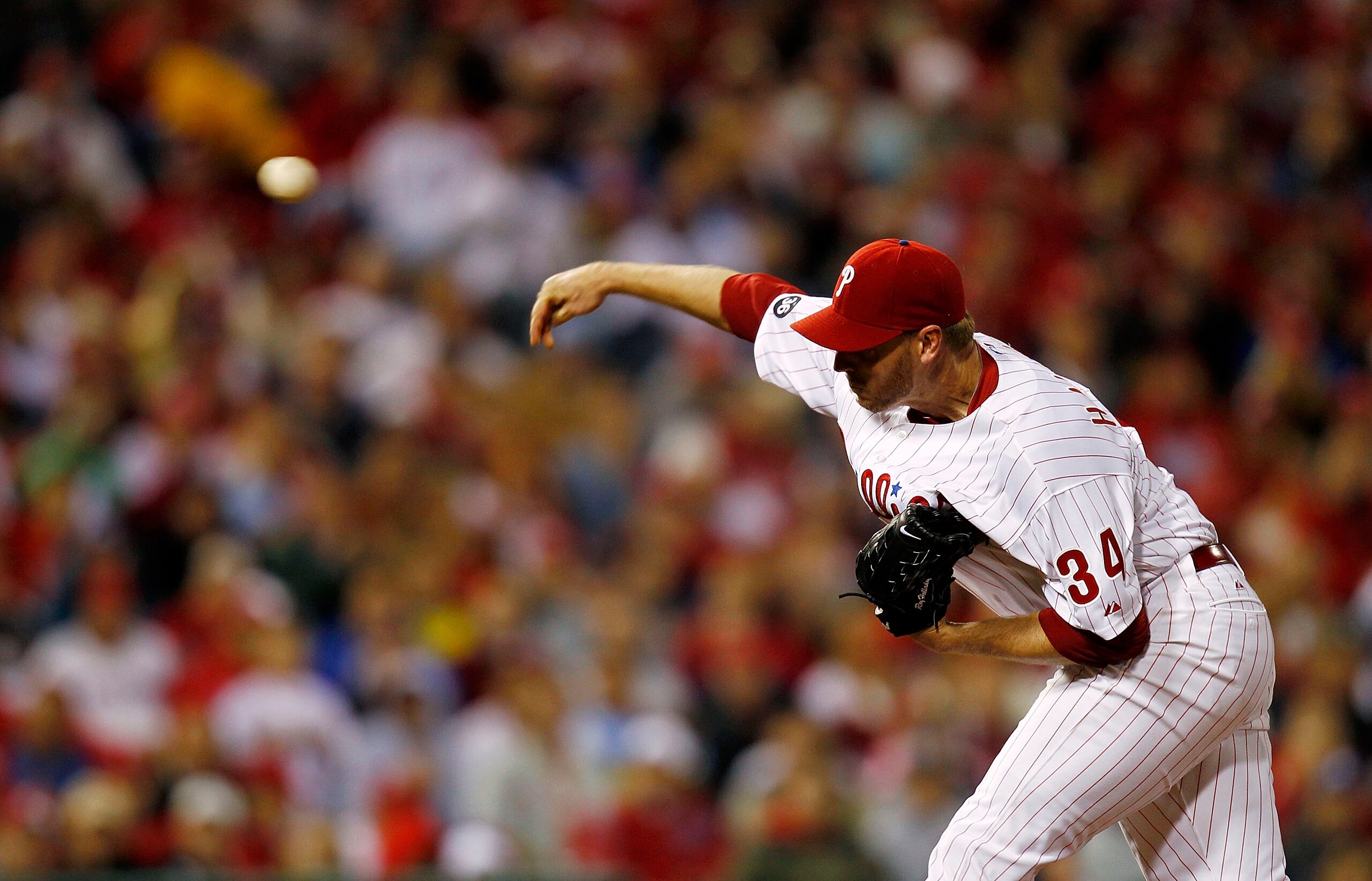PHILADELPHIA - OCTOBER 06: Roy Halladay #34 of the Philadelphia Phillies delivers in Game 1 of the NLDS against the Cincinnati Reds at Citizens Bank Park on October 6, 2010 in Philadelphia, Pennsylvania. Halladay threw the first postseason no-hitter sinc PHILADELPHIA - OCTOBER 06: Roy Halladay #34 of the Philadelphia Phillies delivers in Game 1 of the NLDS against the Cincinnati Reds at Citizens Bank Park on October 6, 2010 in Philadelphia, Pennsylvania. Halladay threw the first postseason no-hitter sinc