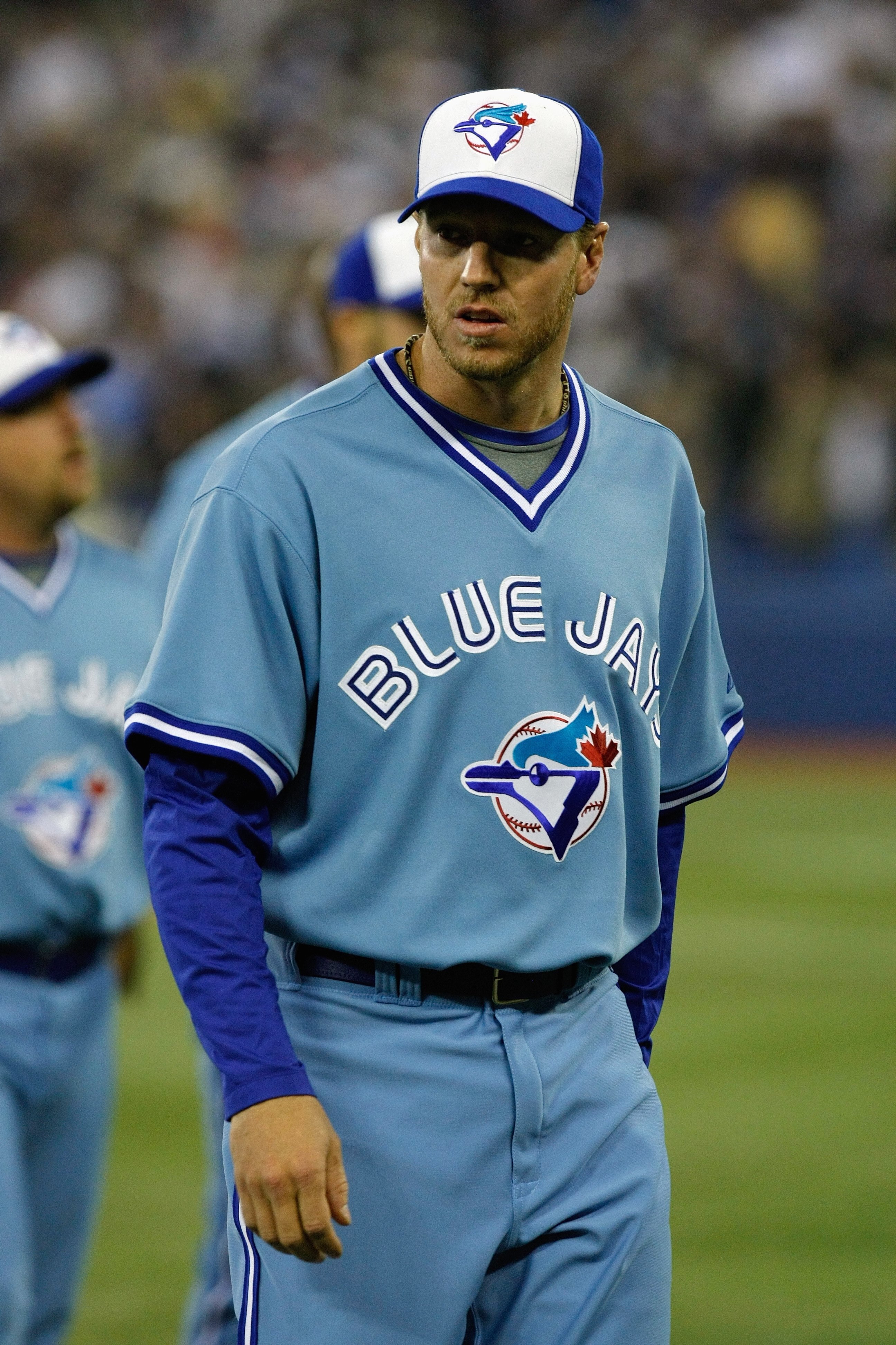 TORONTO - APRIL 4:  Roy Halladay #32 of the Toronto Blue Jays looks on against the Boston Red Sox during the game at Rogers Centre on April 4, 2008 in Toronto, Ontario. (Photo by Dave Sandford/Getty Images)