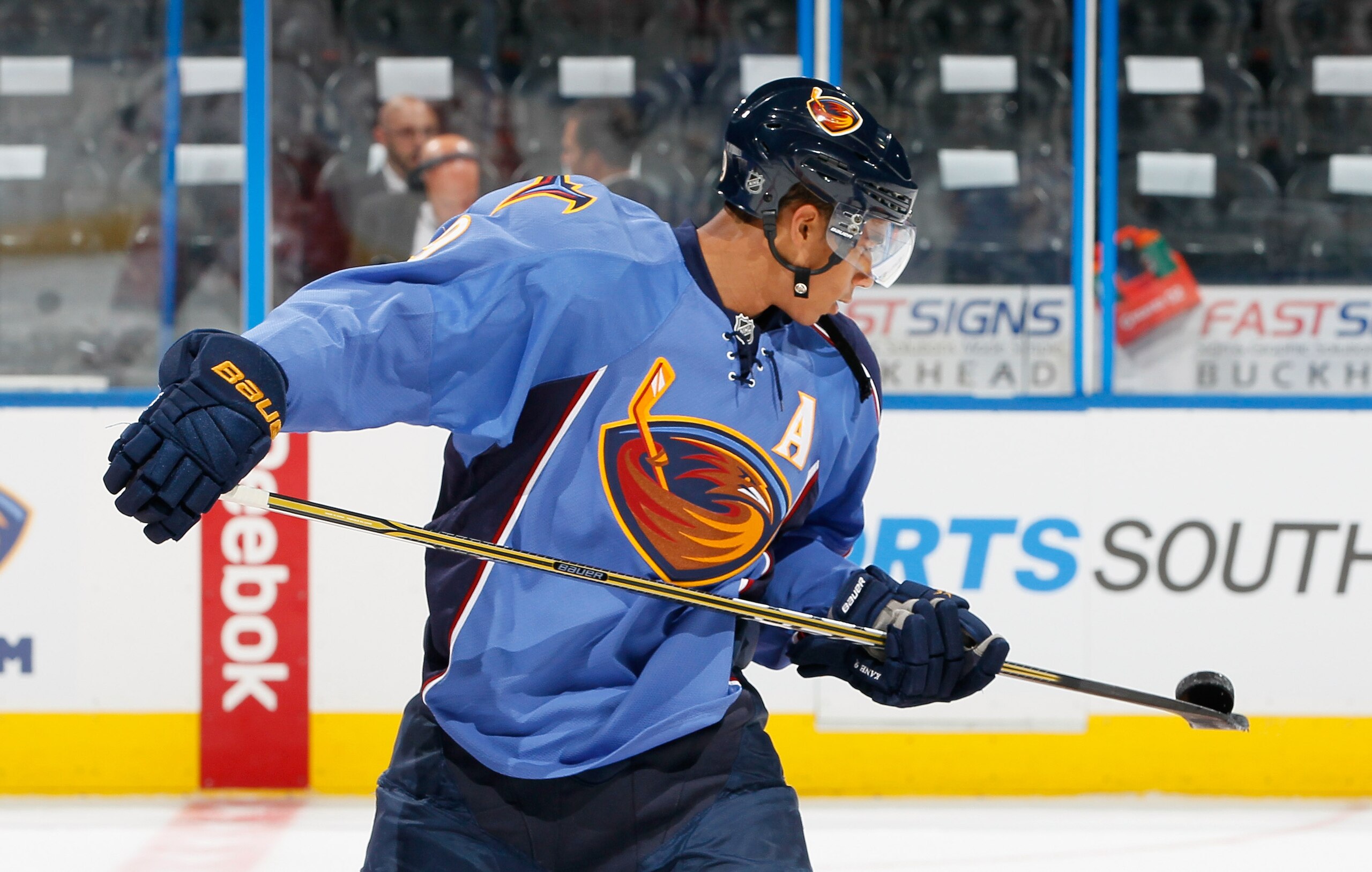 ATLANTA - SEPTEMBER 21: Evander Kane #9 of the Atlanta Thrashers flips a puck around on his stick during warmups before facing the Columbus Blue Jackets during the preseason opener at Phillips Arena on September 21, 2010 in Atlanta, Georgia. (Photo by K ATLANTA - SEPTEMBER 21: Evander Kane #9 of the Atlanta Thrashers flips a puck around on his stick during warmups before facing the Columbus Blue Jackets during the preseason opener at Phillips Arena on September 21, 2010 in Atlanta, Georgia. (Photo by K