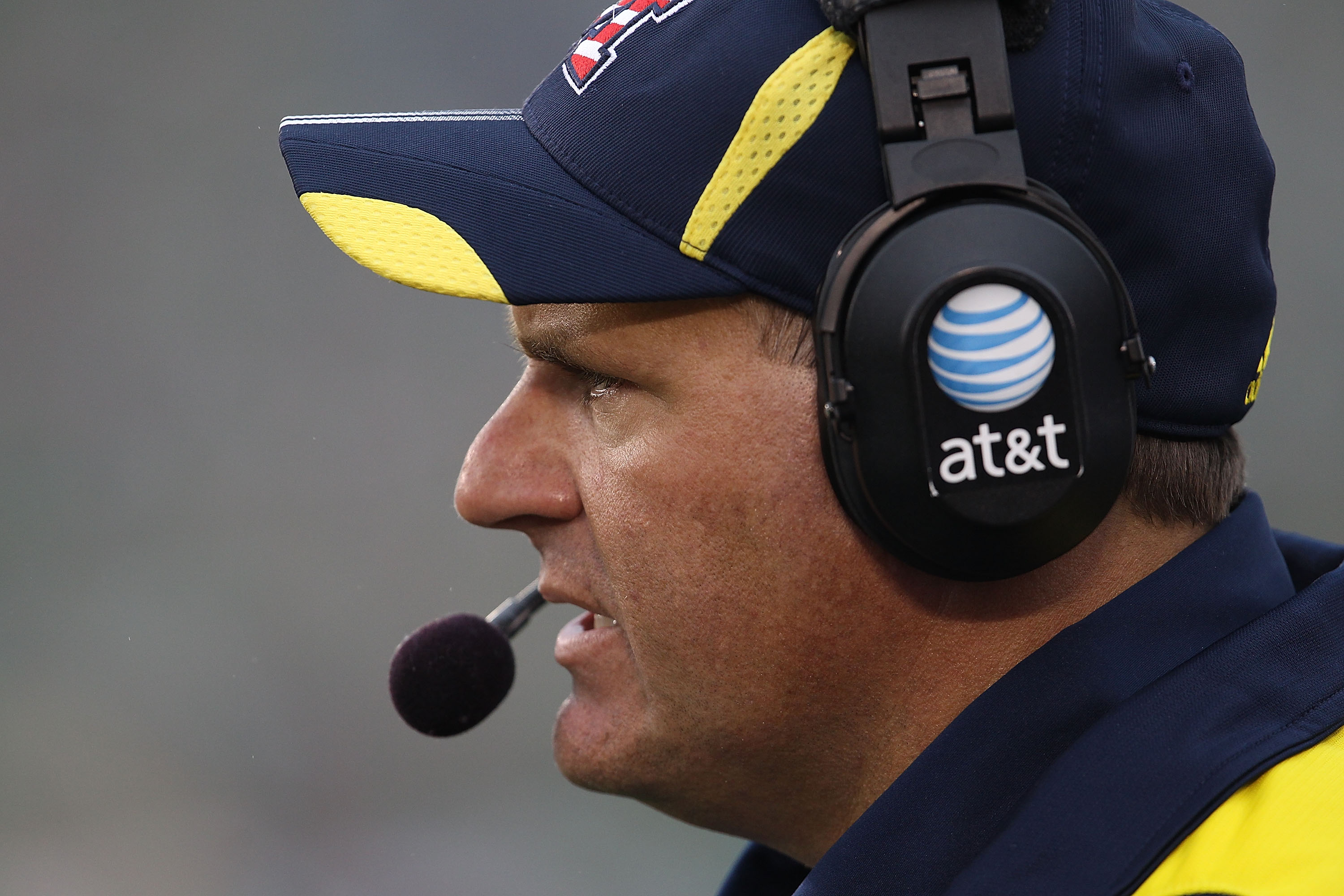 SOUTH BEND, IN - SEPTEMBER 11: Head coach Rich Rodriguez of the Michigan Wolverines watches as his team takes on the Notre Dame Fighting Irish at Notre Dame Stadium on September 11, 2010 in South Bend, Indiana. Michigan defeated Notre Dame 28-24. (Photo SOUTH BEND, IN - SEPTEMBER 11: Head coach Rich Rodriguez of the Michigan Wolverines watches as his team takes on the Notre Dame Fighting Irish at Notre Dame Stadium on September 11, 2010 in South Bend, Indiana. Michigan defeated Notre Dame 28-24. (Photo