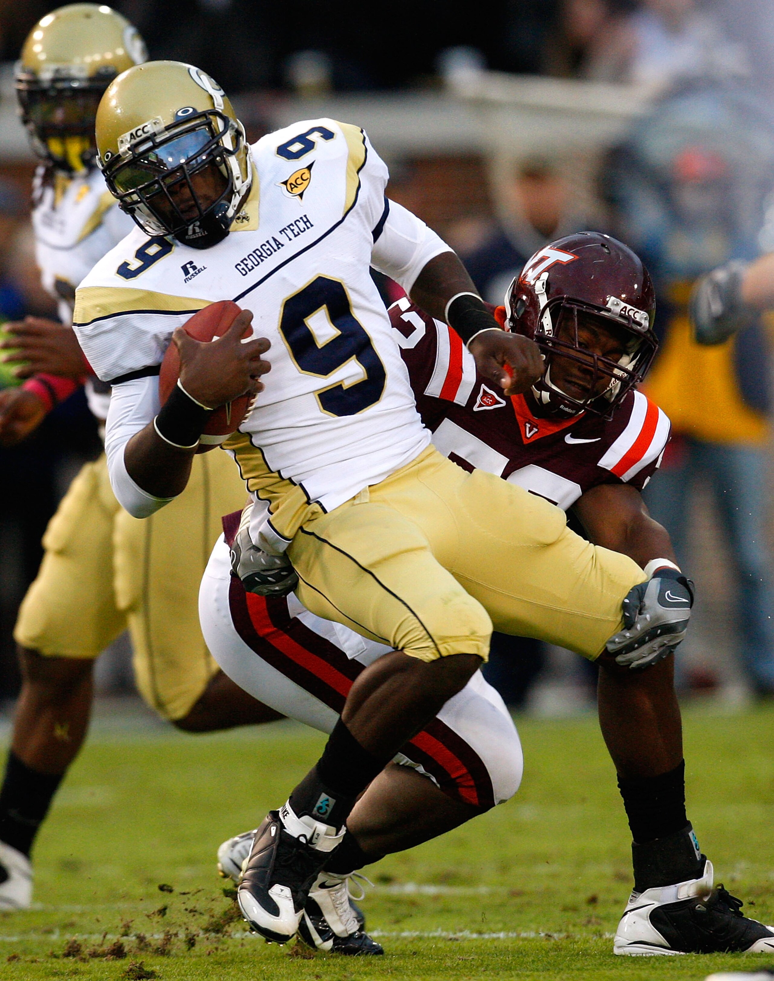 ATLANTA - OCTOBER 17: Quarterback Josh Nesbitt #9 of the Georgia Tech Yellow Jackets rushes upfield against Barquell Rivers #52 of the Virginia Tech Hokies at Bobby Dodd Stadium on October 17, 2009 in Atlanta, Georgia. (Photo by Kevin C. Cox/Getty Image ATLANTA - OCTOBER 17: Quarterback Josh Nesbitt #9 of the Georgia Tech Yellow Jackets rushes upfield against Barquell Rivers #52 of the Virginia Tech Hokies at Bobby Dodd Stadium on October 17, 2009 in Atlanta, Georgia. (Photo by Kevin C. Cox/Getty Image