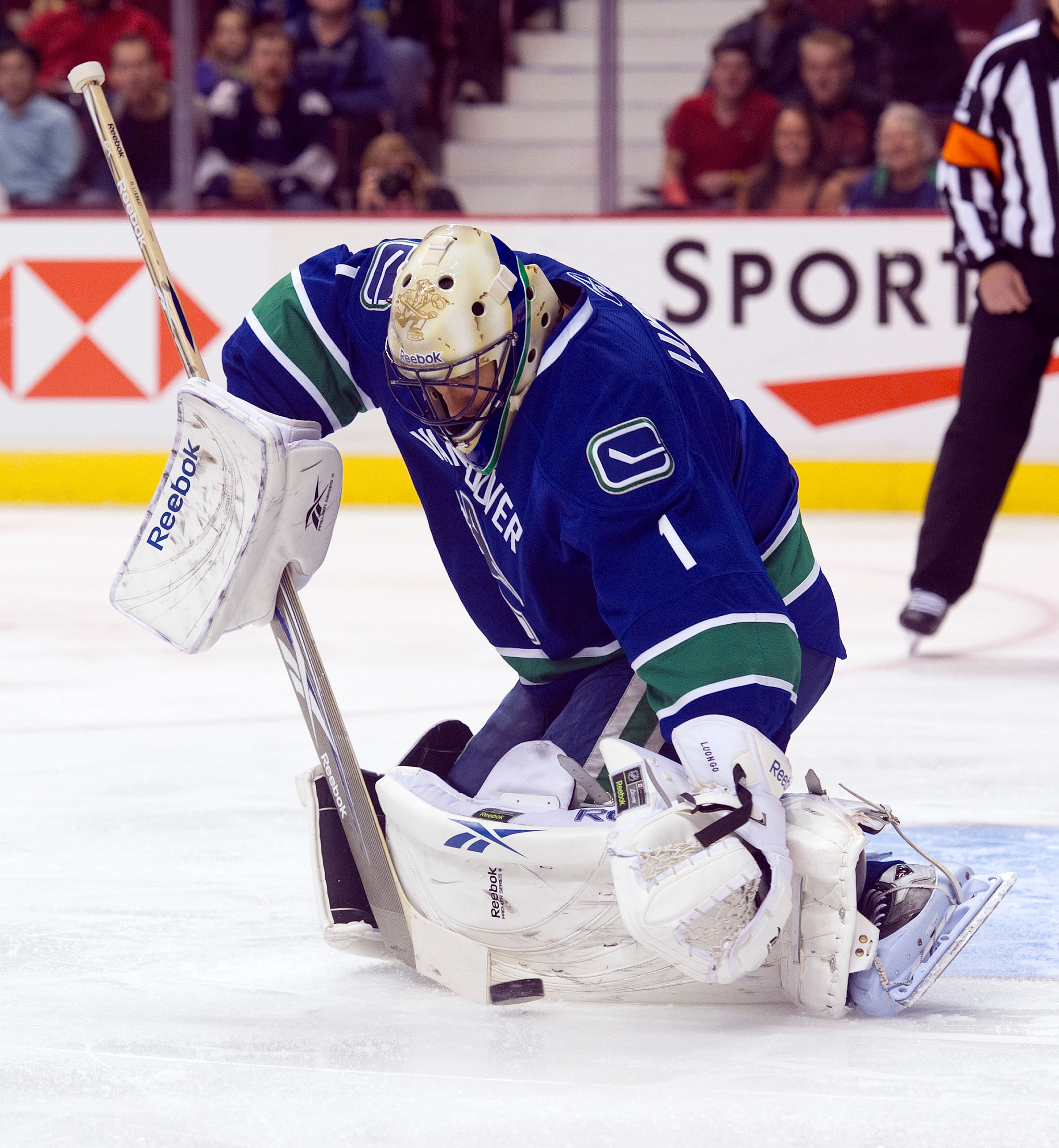 VANCOUVER, CANADA - SEPTEMBER 22: Goalie Roberto Luongo #1 of the Vancouver Canucks makes during NHL pre-season action against the Edmonton Oilers on September 22, 2010 at Rogers Arena in Vancouver, British Columbia, Canada.  (Photo by Rich Lam/Getty Imag