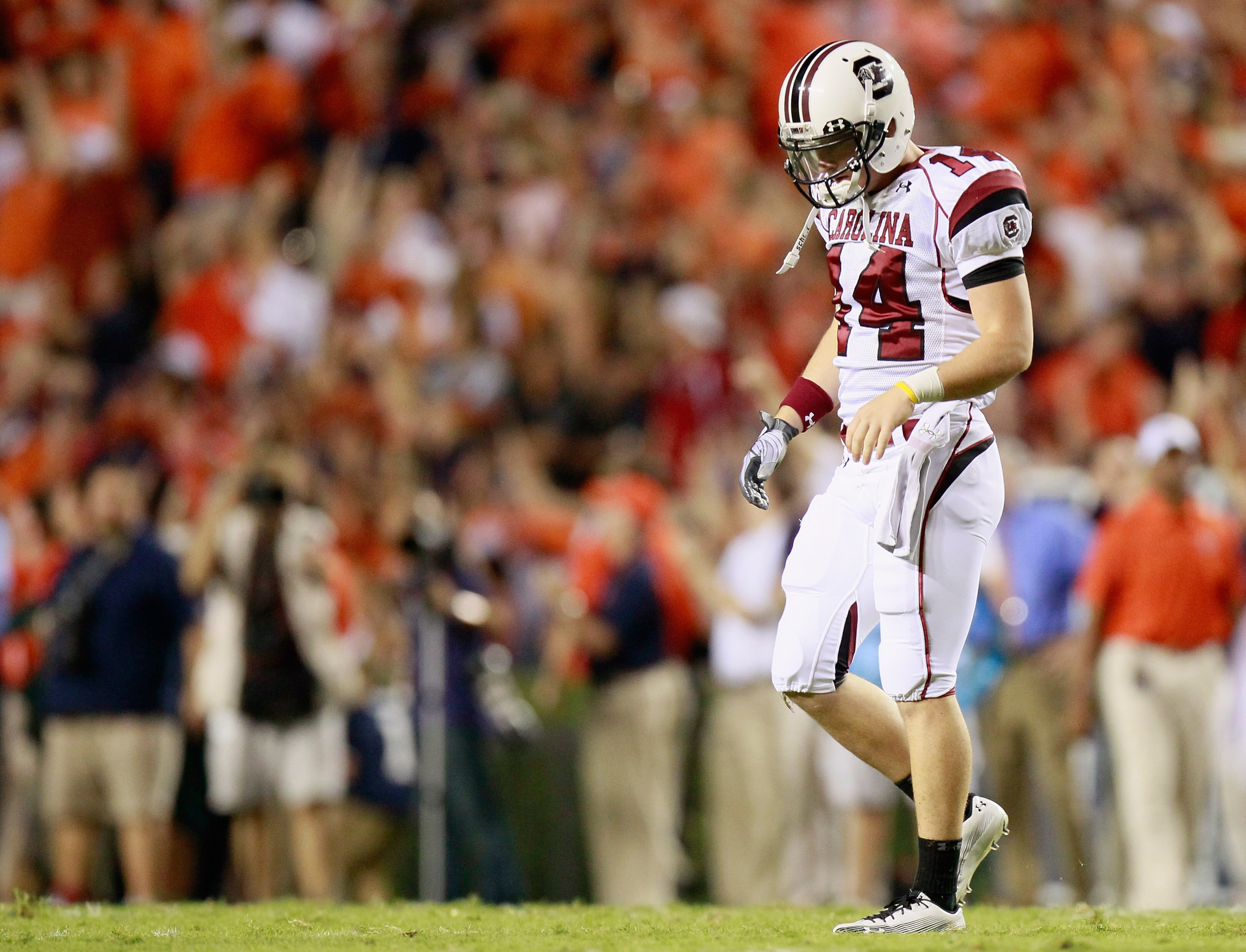 AUBURN, AL - SEPTEMBER 25: Backup quarterback Connor Shaw #14 of the South Carolina Gamecocks walks off the field after throwing an interception to the Auburn Tigers at Jordan-Hare Stadium on September 25, 2010 in Auburn, Alabama. (Photo by Kevin C. Cox AUBURN, AL - SEPTEMBER 25: Backup quarterback Connor Shaw #14 of the South Carolina Gamecocks walks off the field after throwing an interception to the Auburn Tigers at Jordan-Hare Stadium on September 25, 2010 in Auburn, Alabama. (Photo by Kevin C. Cox