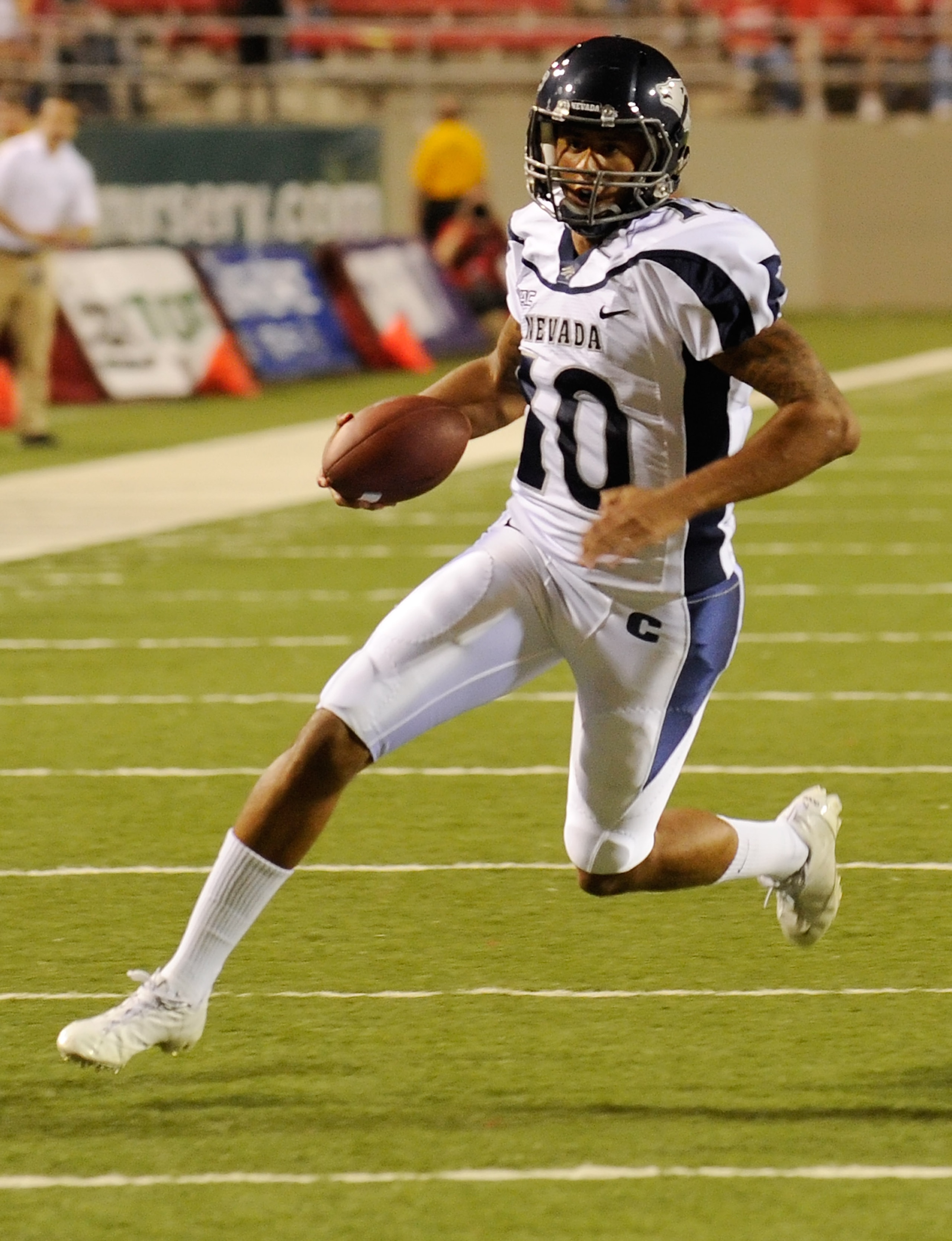 LAS VEGAS - OCTOBER 02:  Quarterback Colin Kaepernick #10 of the Nevada Reno Wolf Pack runs for a touchdown against the UNLV Rebels in the first quarter of their game at Sam Boyd Stadium October 2, 2010 in Las Vegas, Nevada. Nevada Reno won 44-26.  (Photo