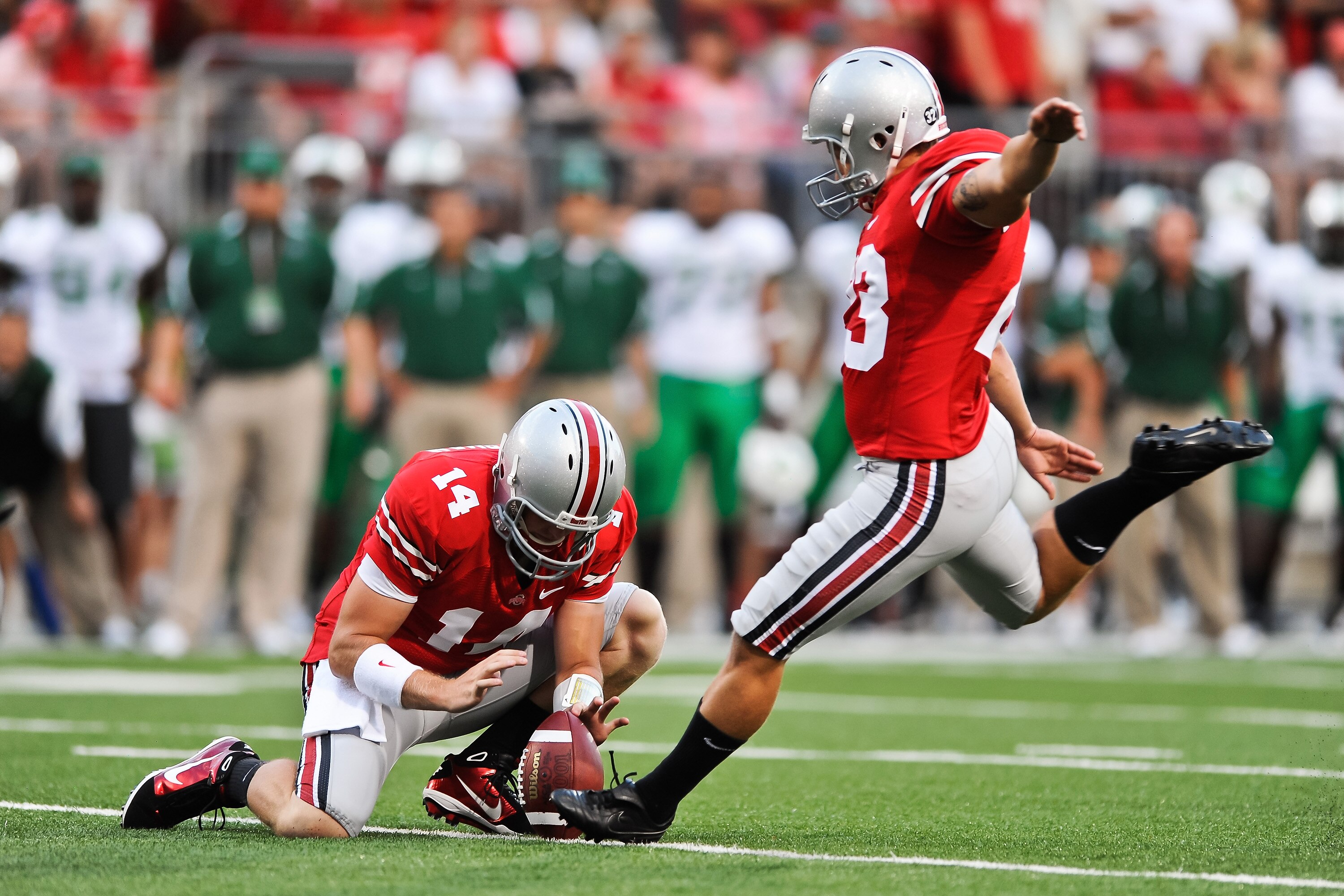 COLUMBUS, OH - SEPTEMBER 2: Devin Barclay #23 of the Ohio State Buckeyes kicks an extra point against the Marshall Thundering Herd at Ohio Stadium on September 2, 2010 in Columbus, Ohio. (Photo by Jamie Sabau/Getty Images)