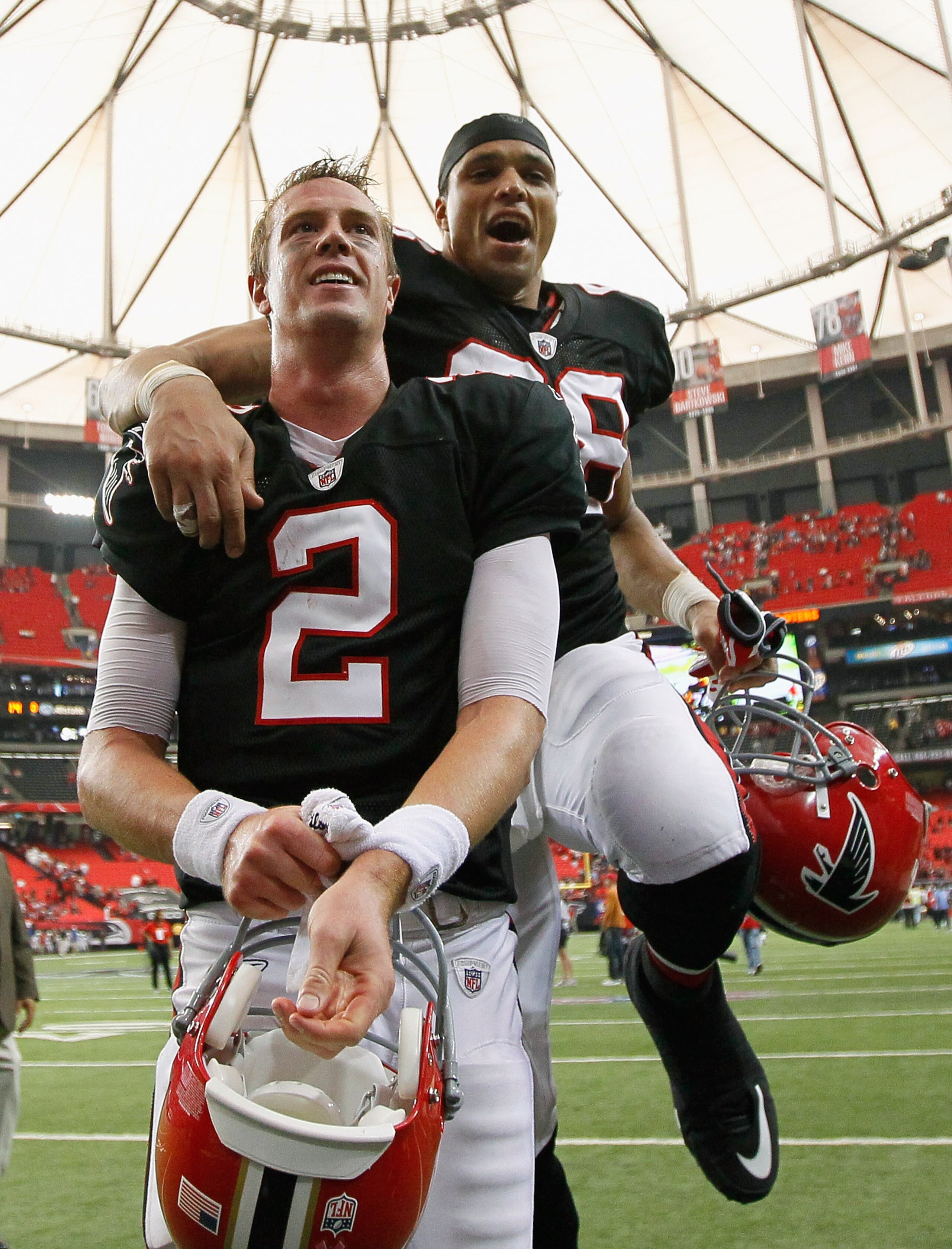 ATLANTA - OCTOBER 03:  Quarterback Matt Ryan #2 and Tony Gonzalez #88 of the Atlanta Falcons celebrate after their 16-14 win over the San Francisco 49ers at Georgia Dome on October 3, 2010 in Georgia.  (Photo by Kevin C. Cox/Getty Images)