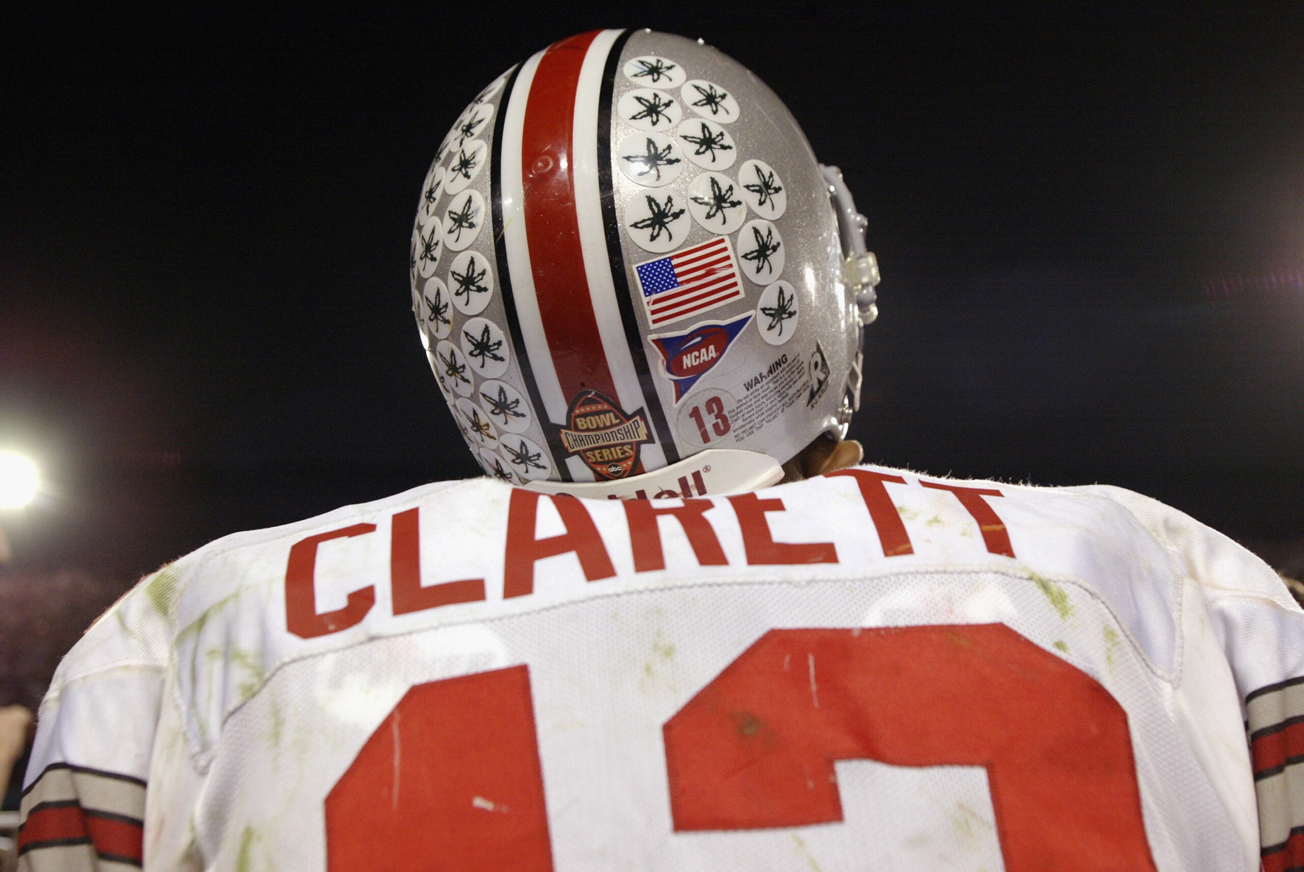TEMPE, ARIZONA - JANUARY 3:  Tailback Maurice Clarett #13 of the Ohio State Buckeyes takes in the victory over the University of Miami Hurricanes in the Tostitos Fiesta Bowl at Sun Devil Stadium on January 3, 2003 in Tempe, Arizona.  Ohio State won the ga