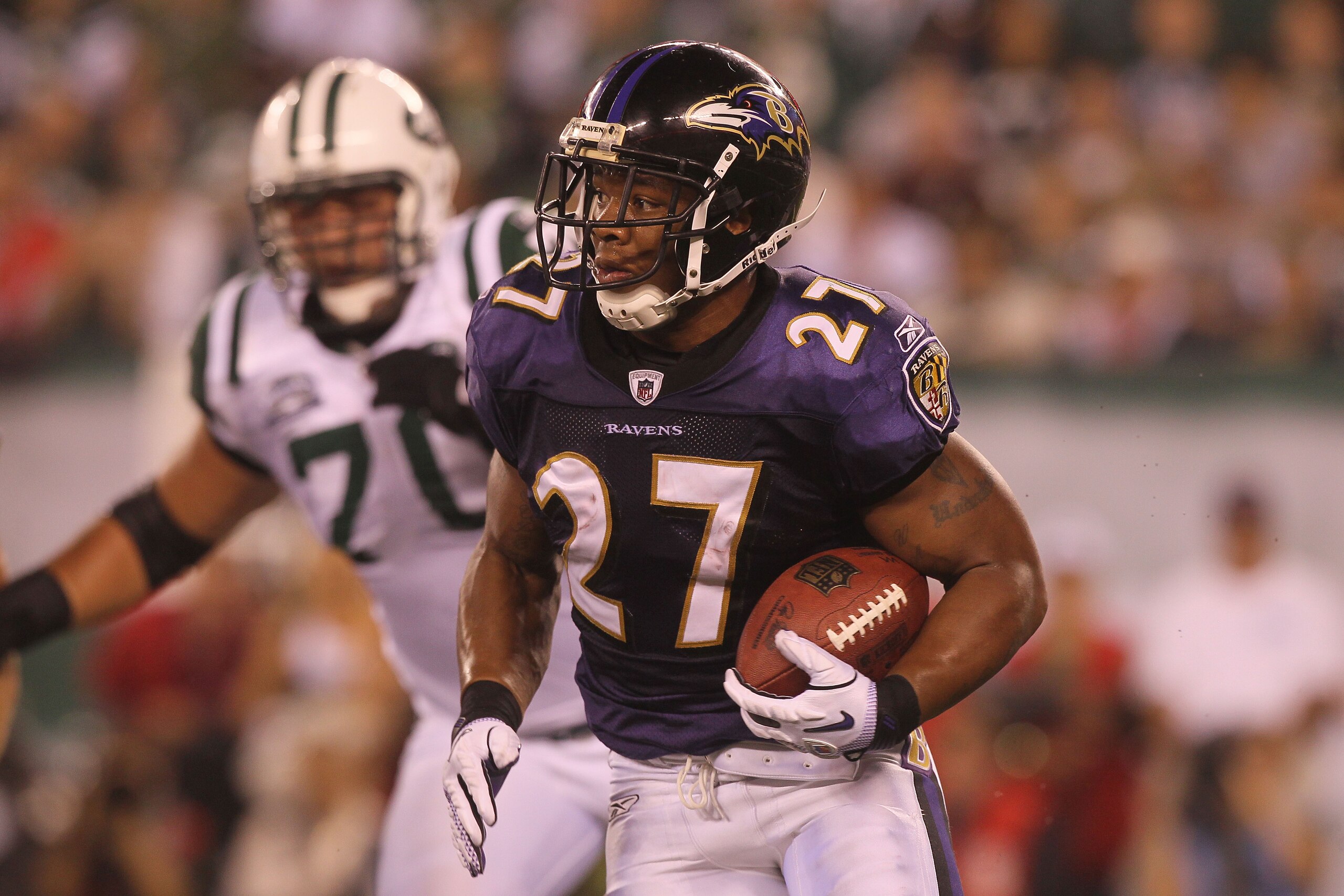 EAST RUTHERFORD, NJ - SEPTEMBER 13:  Ray Rice #27 of the Baltimore Ravens runs against the New York Jets during their home opener at the New Meadowlands Stadium on September 13, 2010 in East Rutherford, New Jersey.  (Photo by Jim McIsaac/Getty Images)