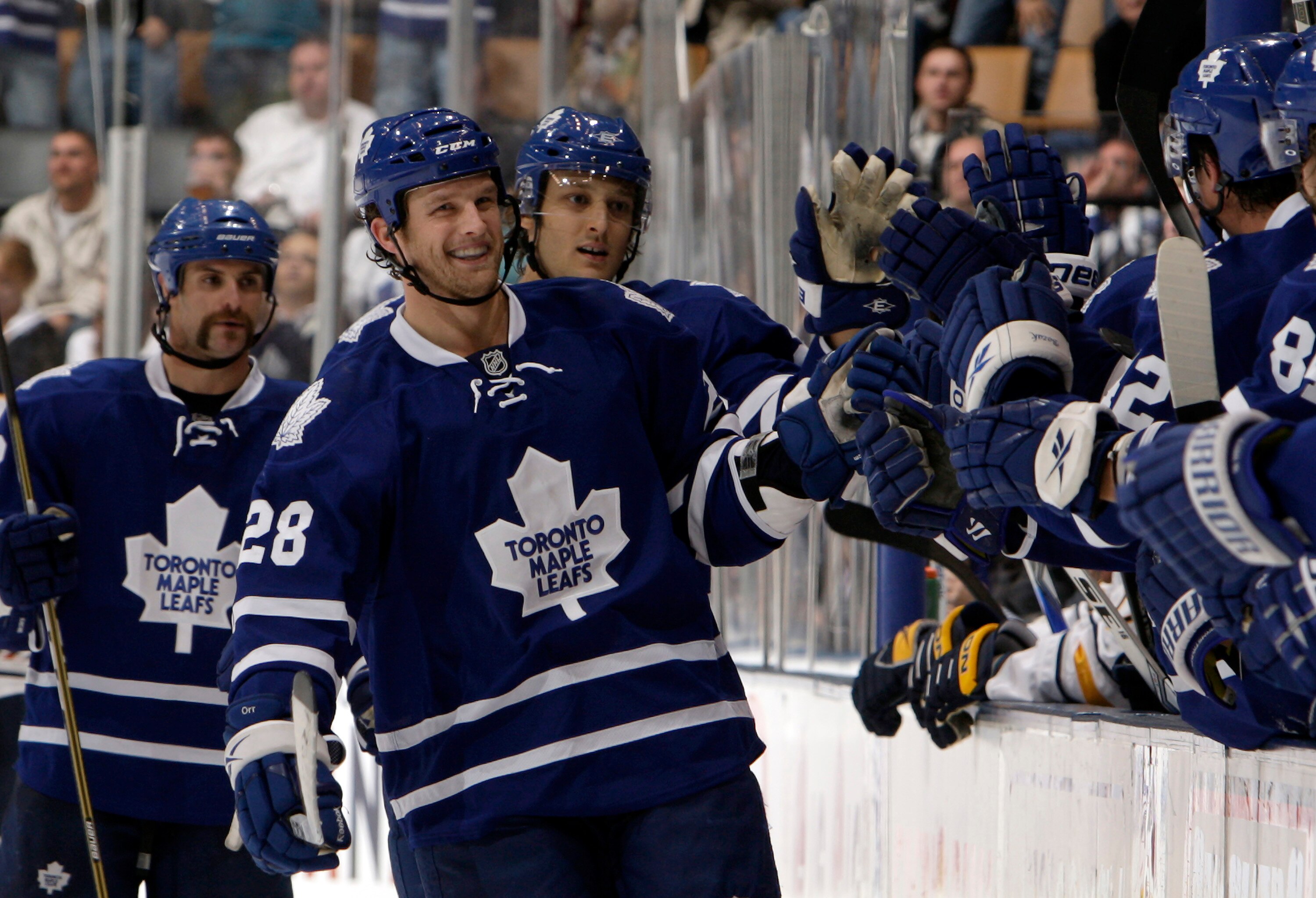 TORONTO - SEPTEMBER 27: Colton Orr #28 of the Toronto Maple Leafs celebrates goal against the Buffalo Sabres during a preseason NHL game at the Air Canada Centre September 27, 2010 in Toronto, Ontario, Canada. (Photo by Abelimages/Getty Images)