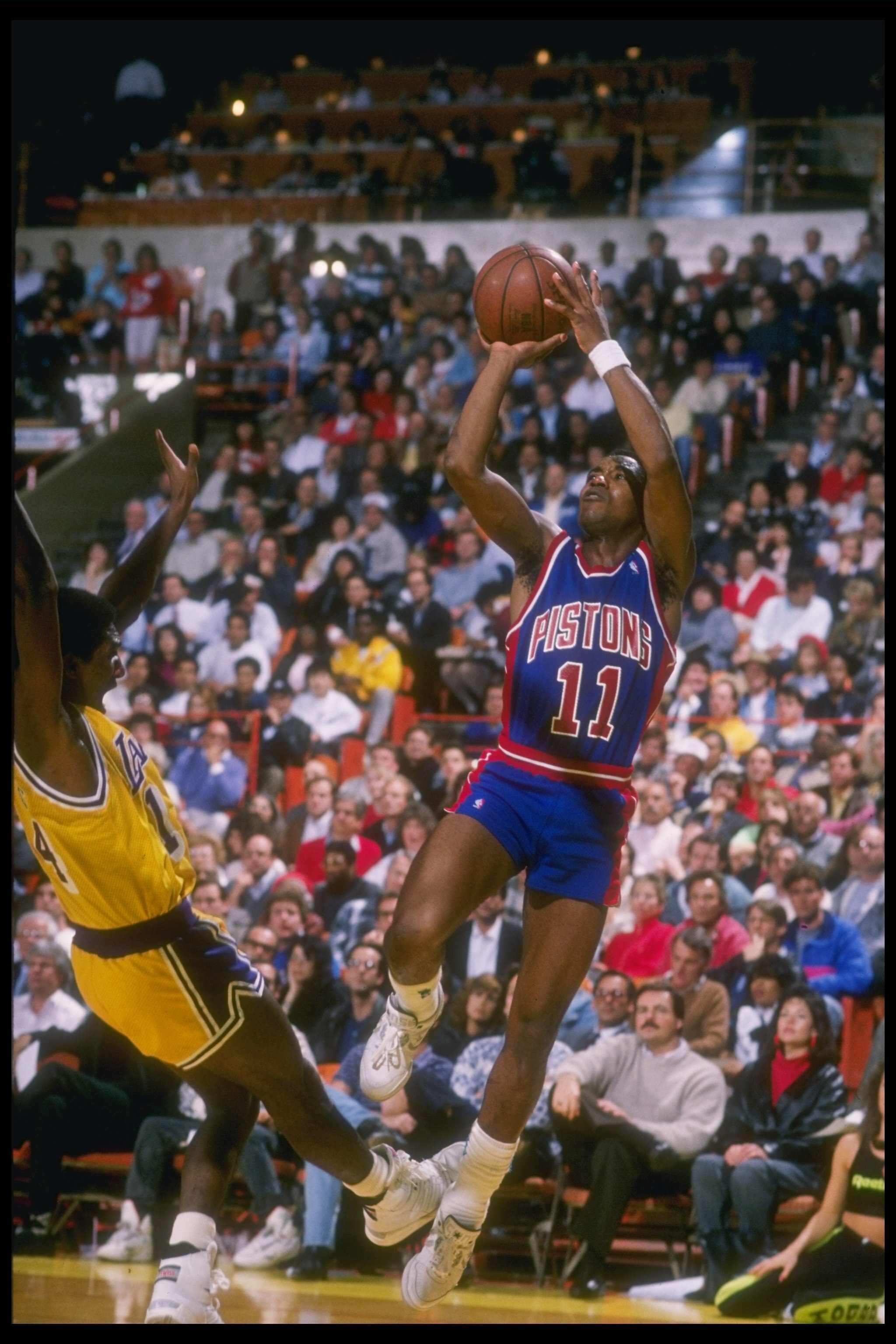 1989-1990:  Guard Isiah Thomas of the Detroit Pistons takes a shot during a game. Mandatory Credit: Jonathan Daniel  /Allsport Mandatory Credit: Jonathan Daniel  /Allsport
