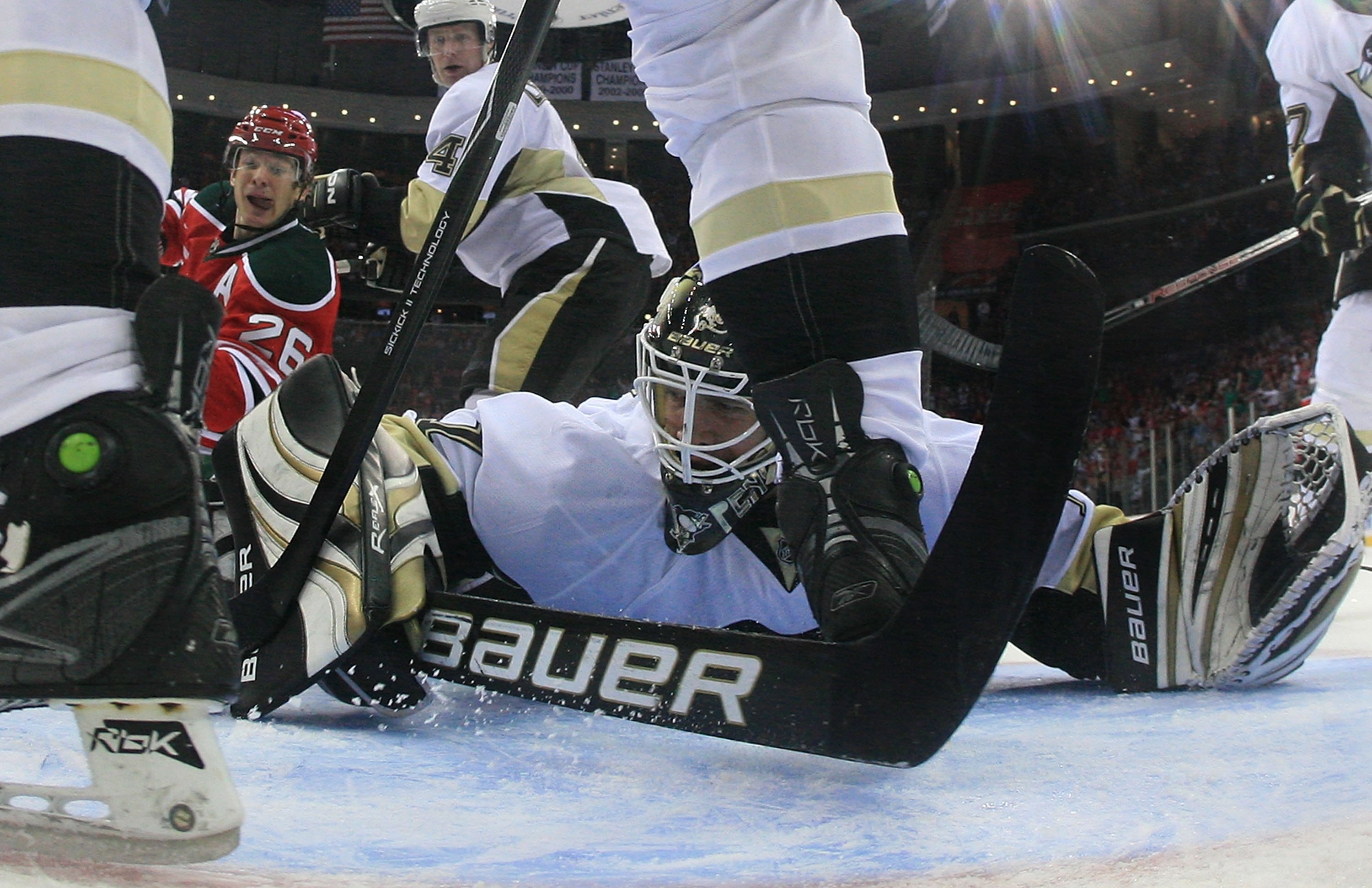 NEWARK, NJ - MARCH 17: Marc-Andre Fleury #29 of the Pittsburgh Penguins defends again Patrik Elias #26 of the New Jersey Devils at the Prudential Center on March 17, 2010 in Newark, New Jersey.  (Photo by Bruce Bennett/Getty Images)