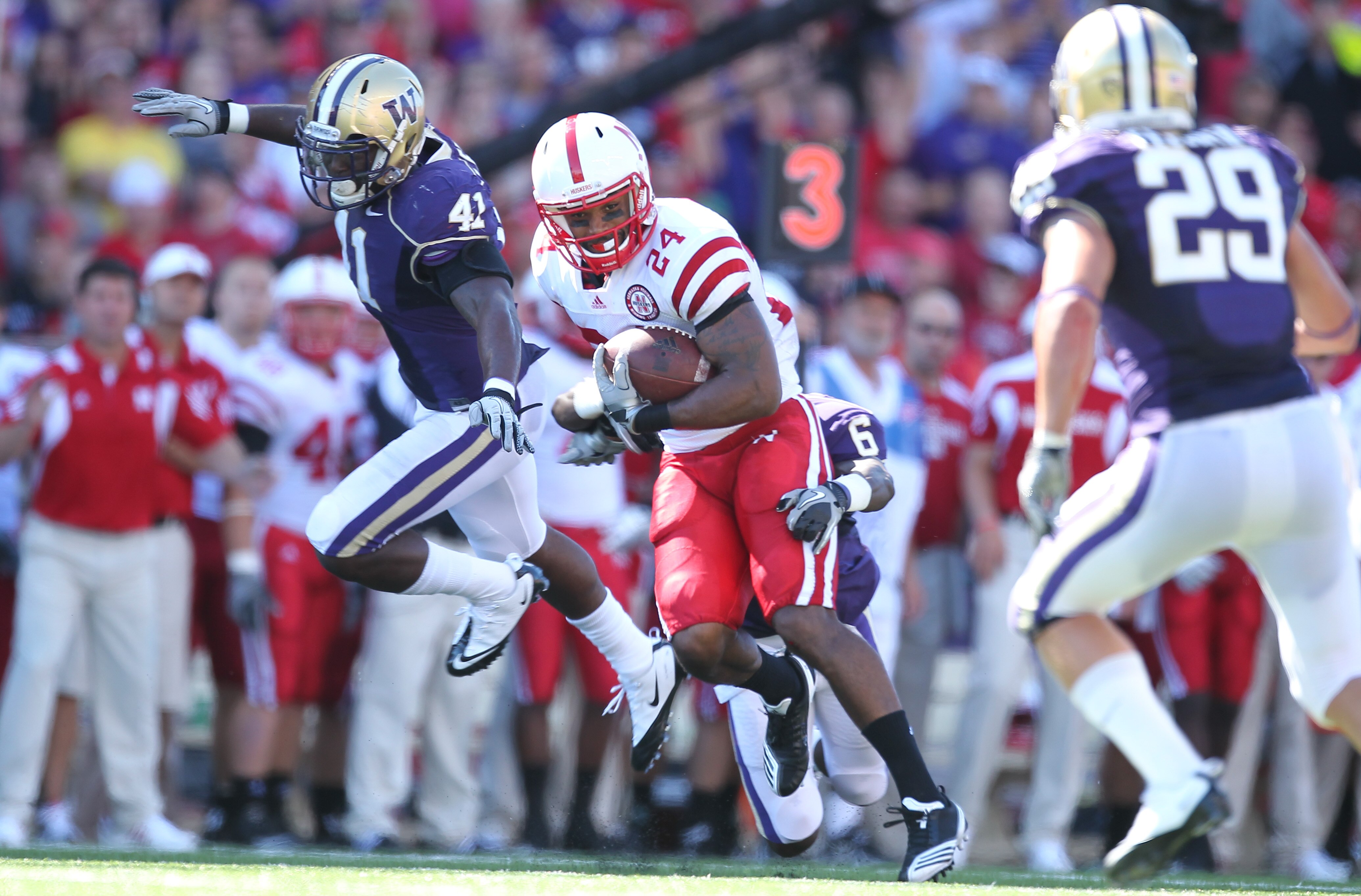 SEATTLE - SEPTEMBER 18: Wide receiver Niles Paul #24 of the Nebraska Cornhuskers rushes against Desmond Trufant #6 of the Washington Huskies on September 18, 2010 at Husky Stadium in Seattle, Washington. (Photo by Otto Greule Jr/Getty Images)