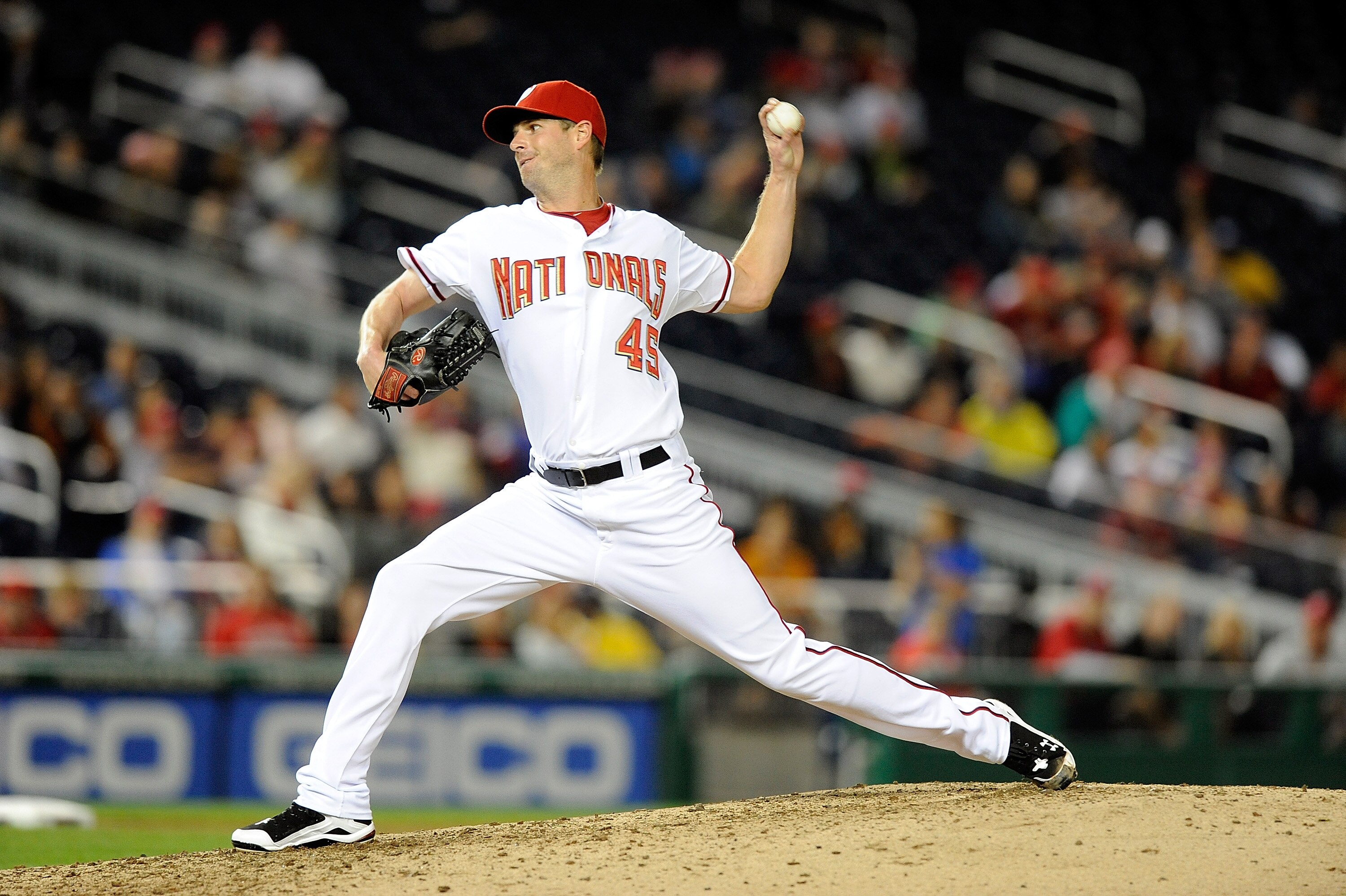 WASHINGTON - SEPTEMBER 29:  Doug Slaten #45 of the Washington Nationals pitches against the Philadelphia Phillies at Nationals Park on September 29, 2010 in Washington, DC.  (Photo by Greg Fiume/Getty Images)