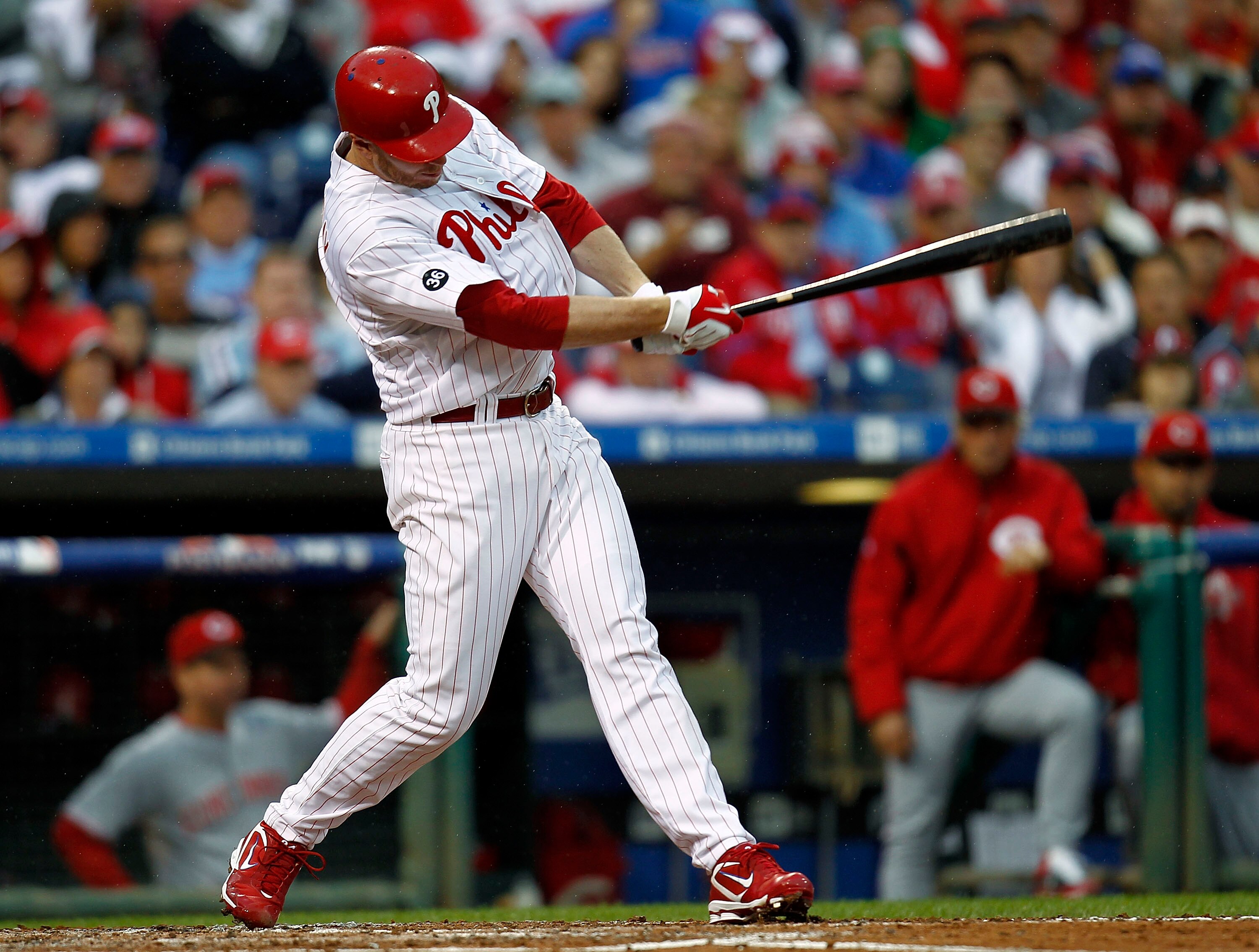 PHILADELPHIA - OCTOBER 06:  Roy Halladay #34 of the Philadelphia Phillies hits an RBI single in Game 1 of the NLDS against the Cincinnati Reds at Citizens Bank Park on October 6, 2010 in Philadelphia, Pennsylvania.  (Photo by Jeff Zelevansky/Getty Images)