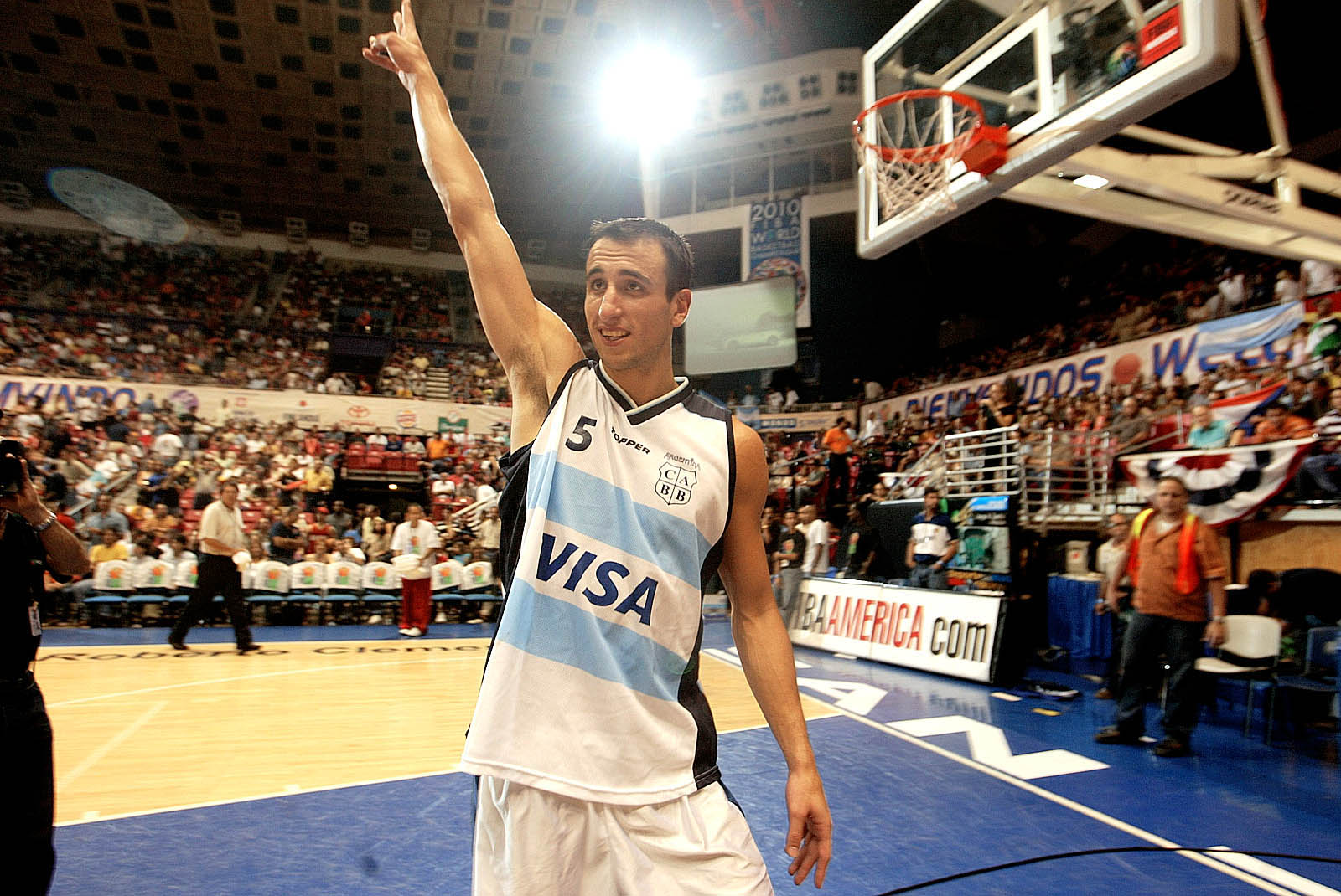 SAN JUAN, PUERTO RICO - AUGUST 30:  ***PUERTO RICO OUT, INTERNET OUT ***  Argentinian player Emanuel Ginobili #5 celebrates after Argentina defeated Canada 88-72 for the semifinal Olympic qualifying game between Canada and Argentina on August 30, 2003 at
