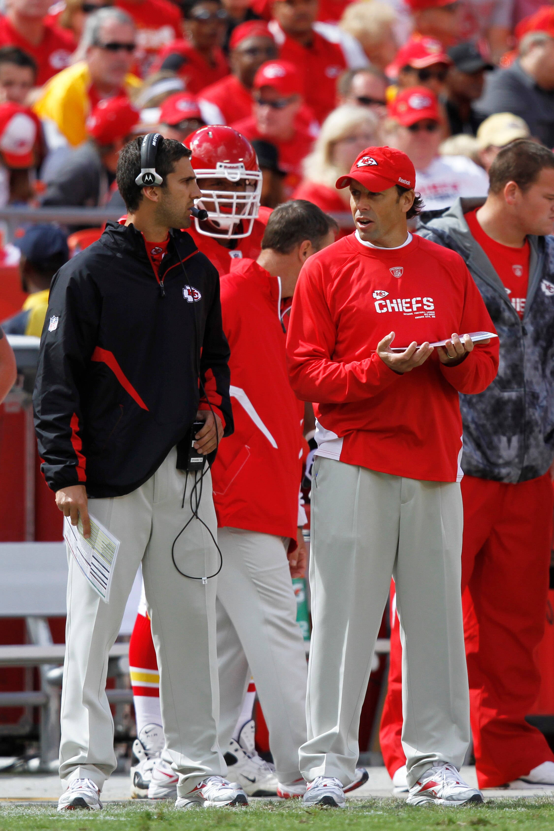 KANSAS CITY, MO - SEPTEMBER 26: Kansas City Chiefs head coach Todd Haley talks with offensive assistant Nick Sirianni during the game against the San Francisco 49ers at Arrowhead Stadium on September 26, 2010 in Kansas City, Missouri. The Chiefs won 31-10