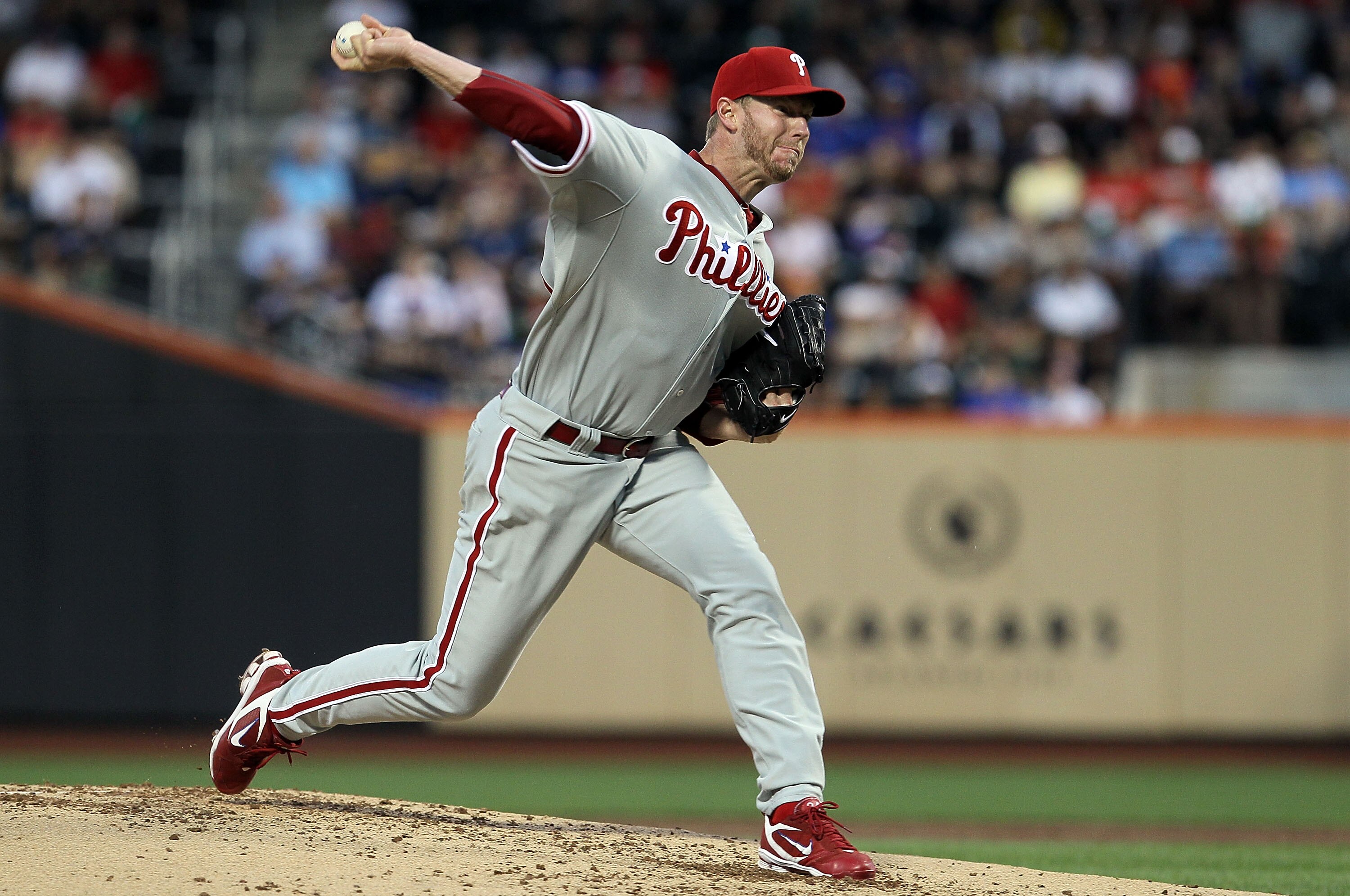 NEW YORK - AUGUST 14:  Roy Halladay #34 of the Philadelphia Phillies delivers a pitch against the New York Mets on August 14, 2010 at Citi Field in the Flushing neighborhood of the Queens borough of New York City.  (Photo by Jim McIsaac/Getty Images)