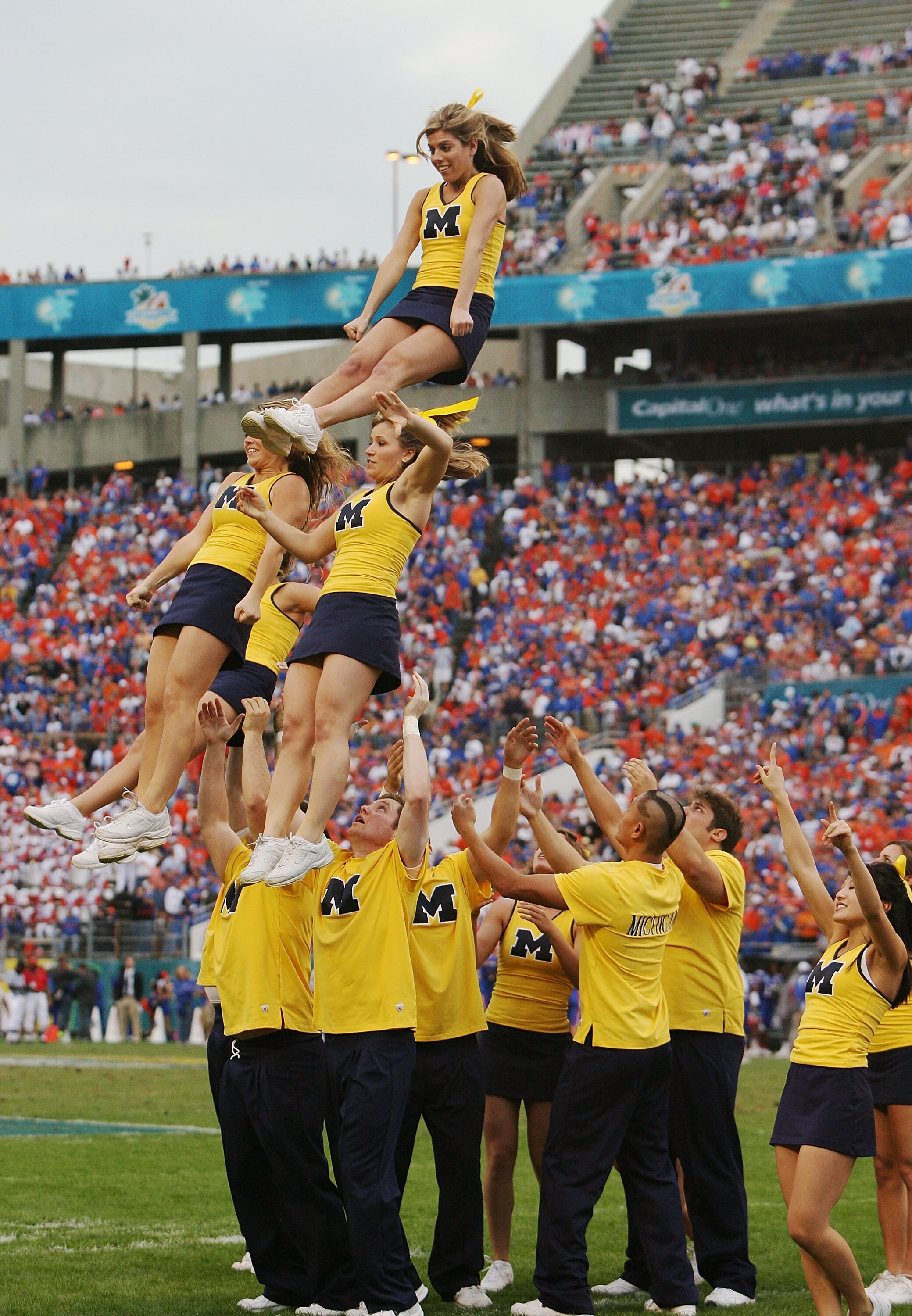 ORLANDO, FL - JANUARY 01:  Michigan cheerleaders perform as the Michigan Wolverines take on the Florida Gators in the Capital One Bowl at Florida Citrus Bowl on January 1, 2008 in Orlando, Florida. Michigan defeated Florida 41-35.  (Photo by Doug Benc/Get