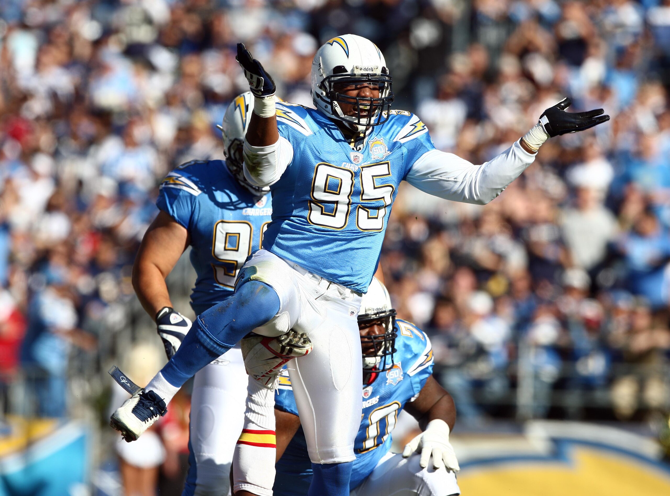 SAN DIEGO, CA - NOVEMBER 29:  Shaun Phillips #95 of the San Diego Chargers celebrates a tackle against the Kansas City Chiefs during the NFL game on November 29, 2009 at Qualcomm Stadium in San Diego, California.  (Photo by Donald Miralle/Getty Images)