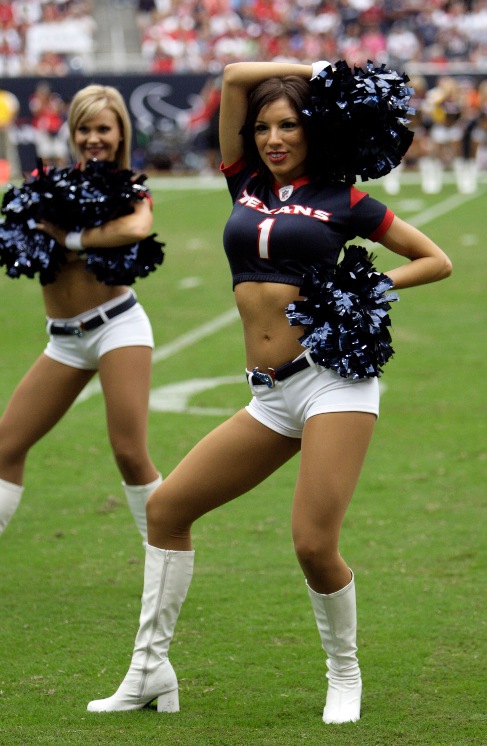 HOUSTON - SEPTEMBER 26:  The Houston Texans cheerleaders perform in the second half during a football game between the Dallas Cowboys and Houston Texans at Reliant Stadium on September 26, 2010 in Houston, Texas.  (Photo by Bob Levey/Getty Images)
