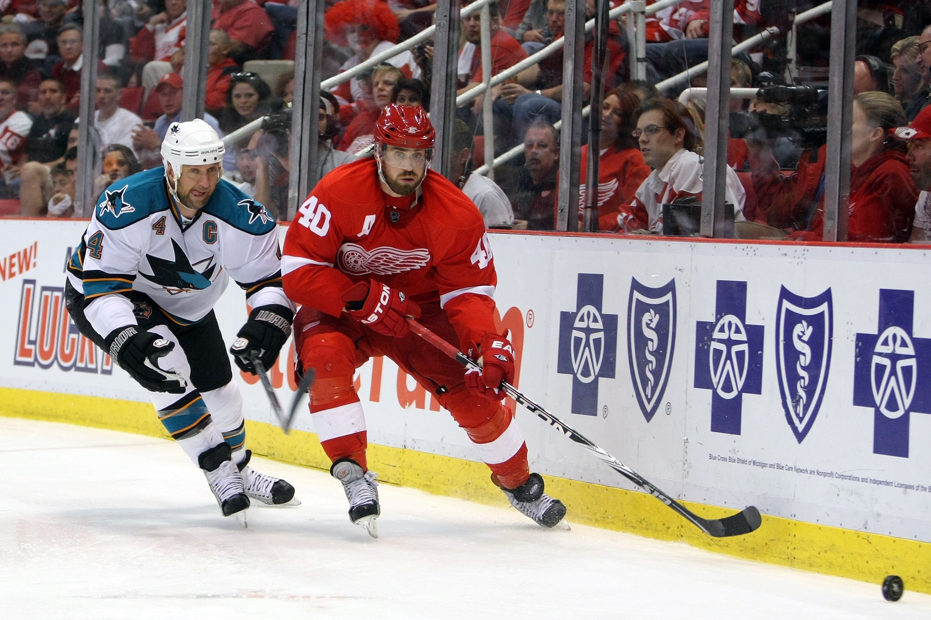 DETROIT - MAY 4:  Henrik Zetterberg #40 of the Detroit Red Wings skates against Rob Blake #4 of the San Jose Sharks in Game Three of the Western Conference Semifinals during the 2010 Stanley Cup Playoffs at Joe Louis Arena on May 4, 2010 in Detroit, Michi