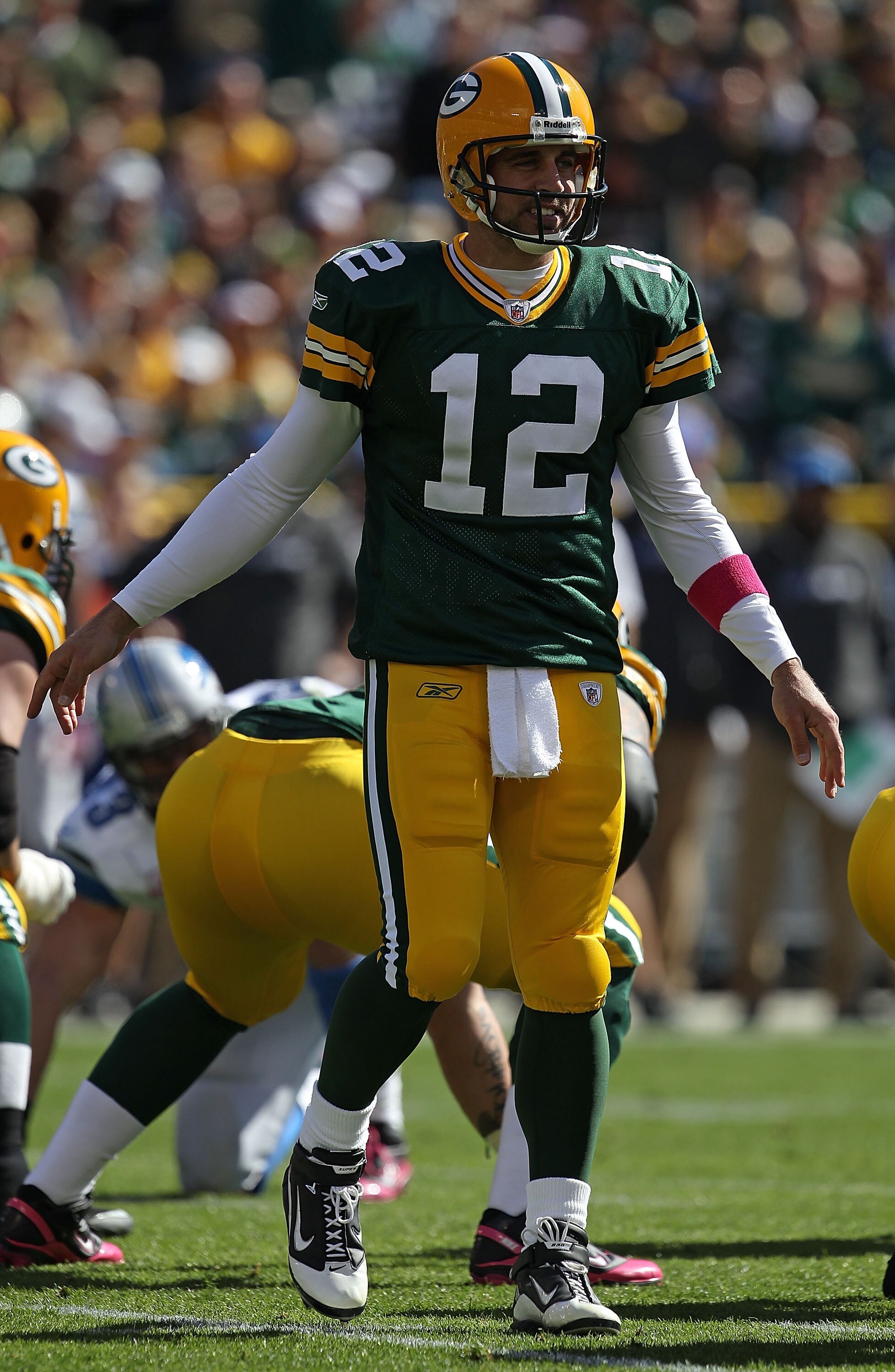 GREEN BAY, WI - OCTOBER 03: Aaron Rodgers #12 of the Green Bay Packers turns to call an audible play against the Detroit Lions at Lambeau Field on October 3, 2010 in Green Bay, Wisconsin. The Packers defeated the Lions 28-26. (Photo by Jonathan Daniel/Get