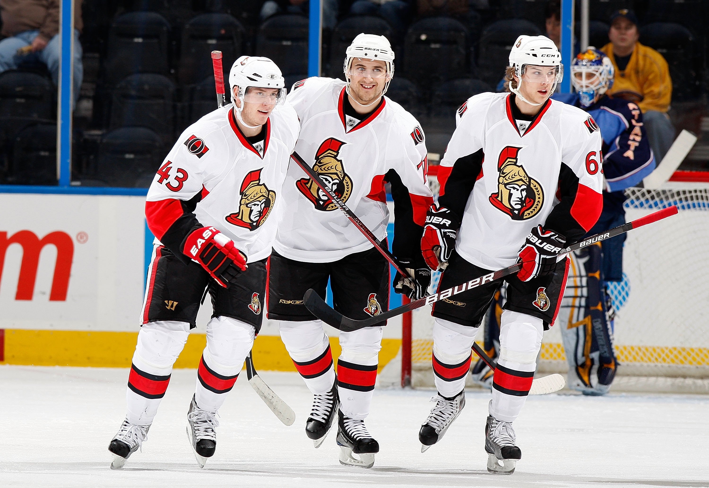 ATLANTA - JANUARY 12:  Peter Regin #43, Nick Foligno #71 and Erik Karlsson #65 of the Ottawa Senators against the Atlanta Thrashers at Philips Arena on January 12, 2010 in Atlanta, Georgia.  (Photo by Kevin C. Cox/Getty Images)