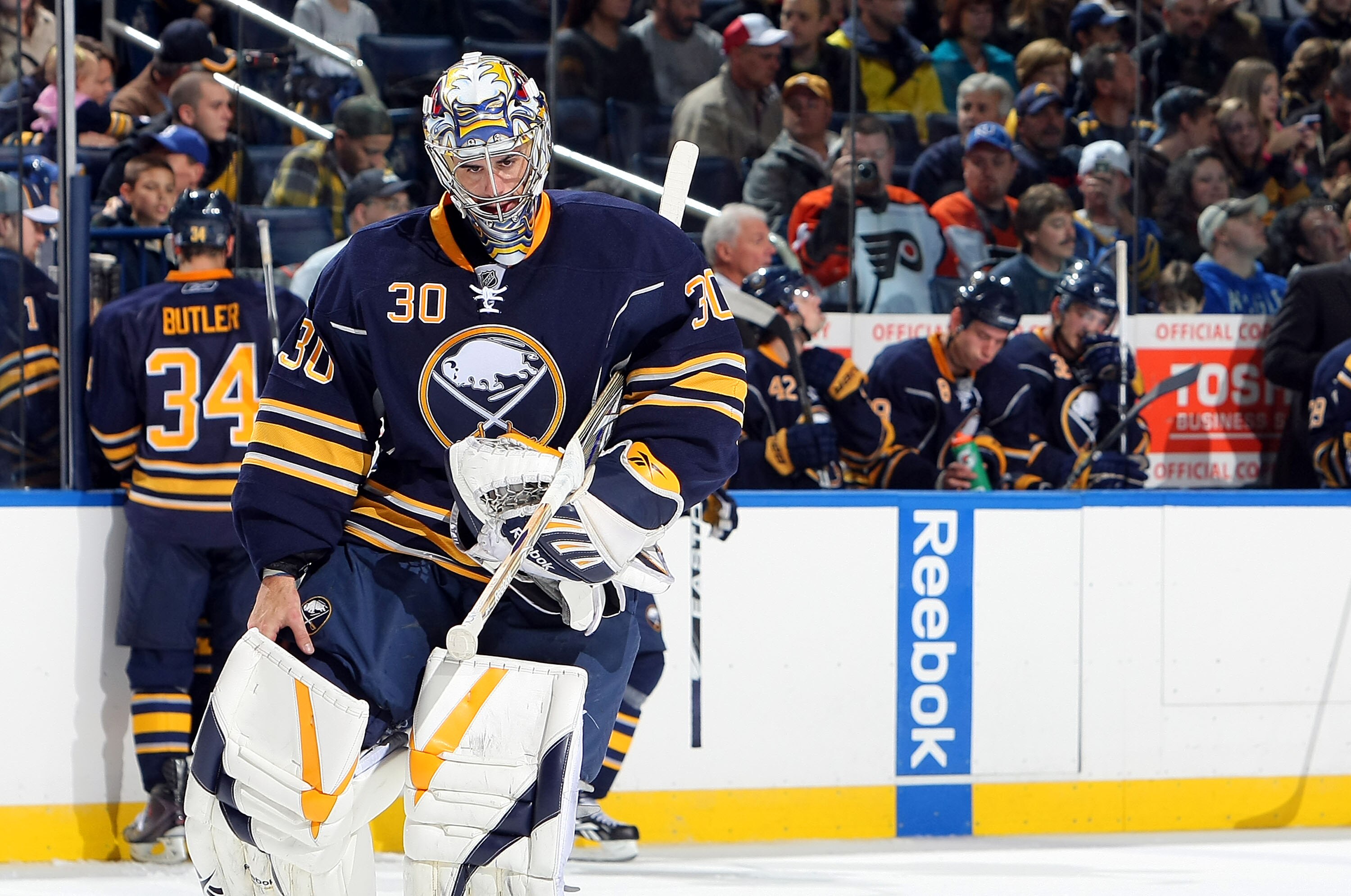 BUFFALO - OCTOBER 3:  Ryan Miller #30 of the Buffalo Sabres adjusts his equipment during stop in play against the Philadelphia Flyers during their NHL game at HSBC Arena October 3, 2010 in Buffalo, New York. The Sabres won 9-3. (Photo By Dave Sandford/Get